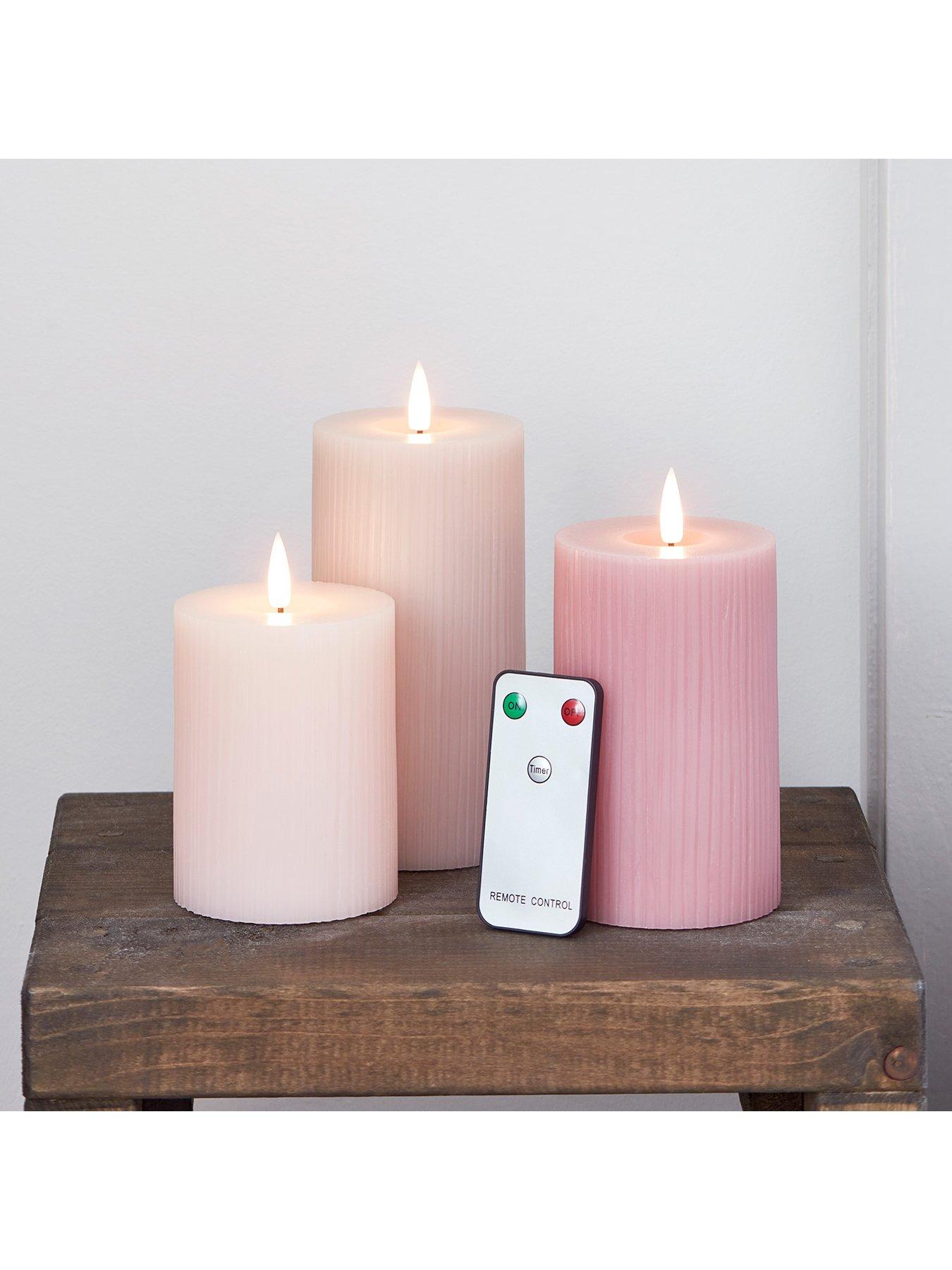 lights4fun-truglow-blush-pink-ribbed-led-pillar-candle-trioback