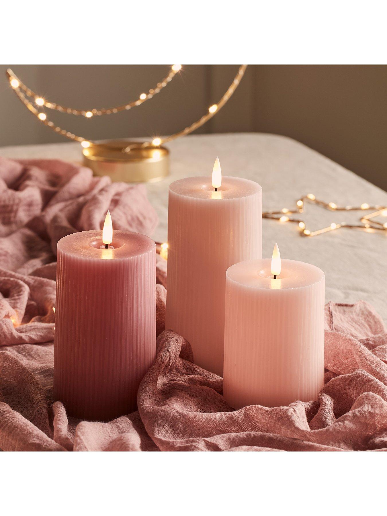 lights4fun-truglow-blush-pink-ribbed-led-pillar-candle-triodetail