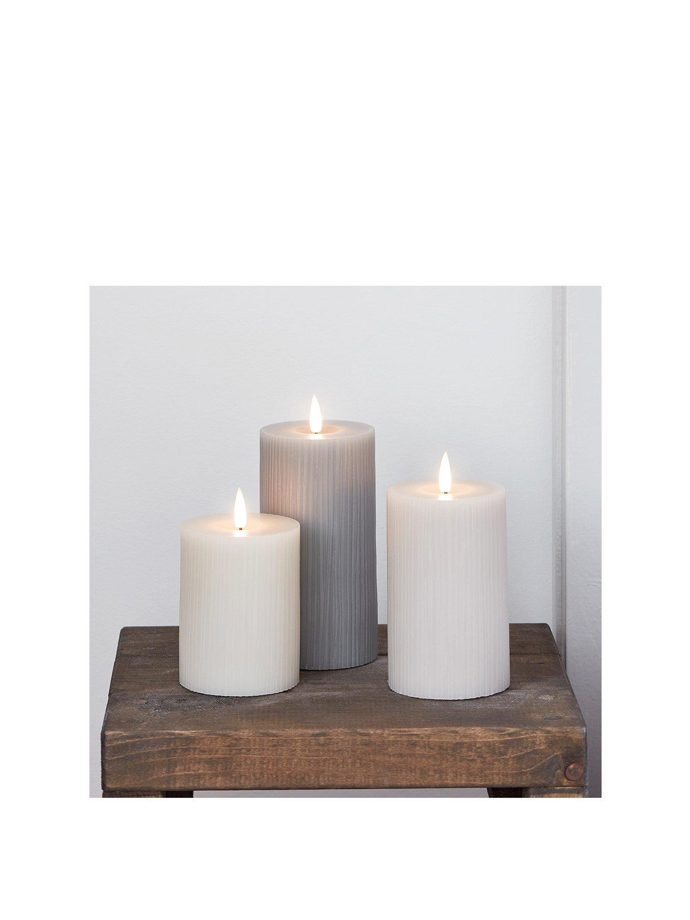 lights4fun-truglow-grey-ribbed-led-pillar-candle-triostillFront