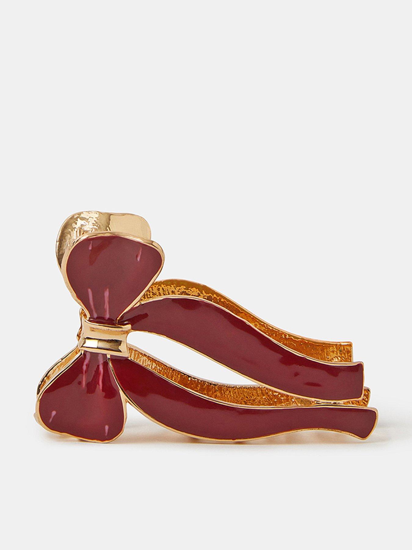 Image 1 of 2 of Accessorize Enamel Metal Bow Claw Clip - Red