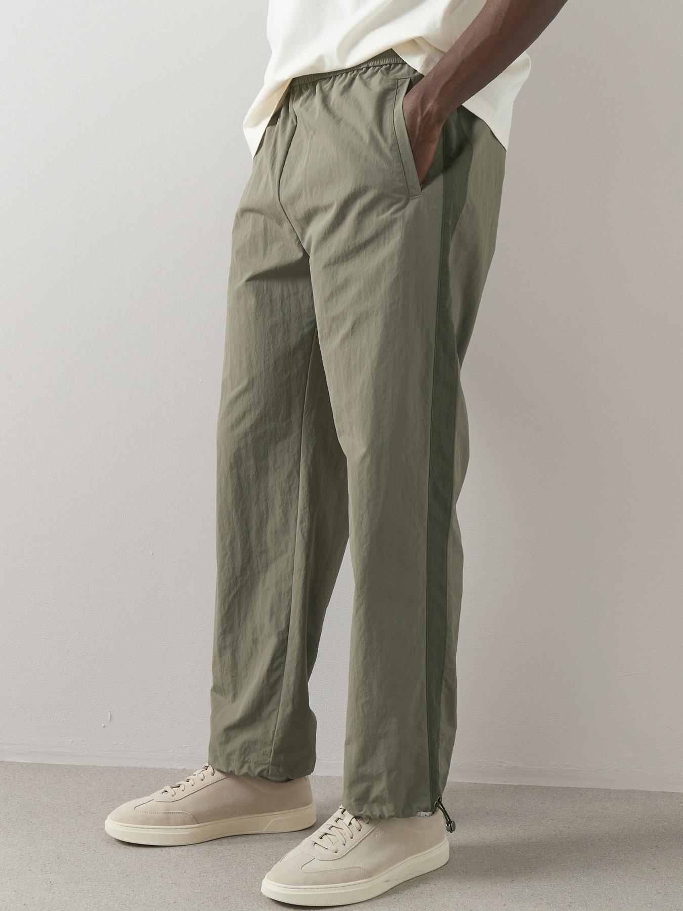 Image 1 of 6 of The Very Collection Tech Elasticated Waist Cuffed Trousers - Green