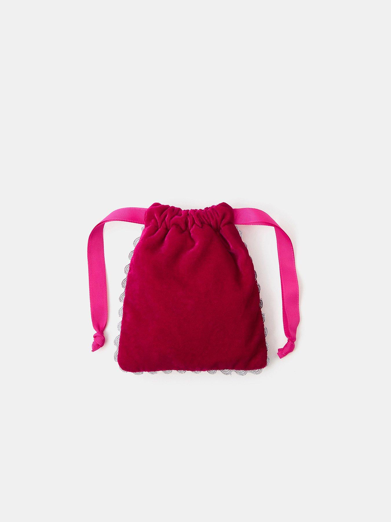 Image 2 of 3 of Accessorize Sequin Bow Drawstring Bag - Pink