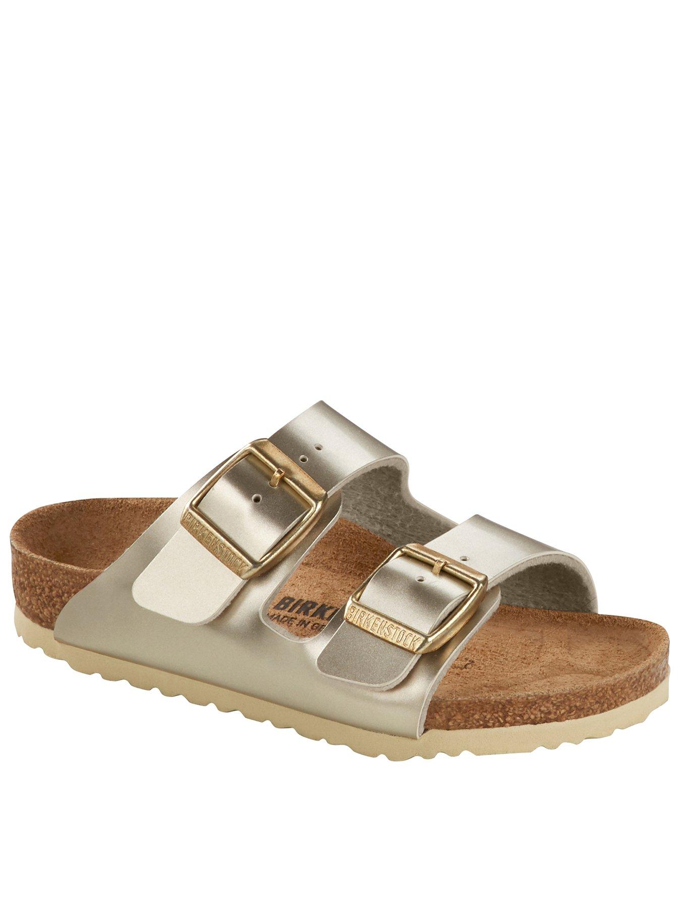 Image 1 of 1 of Birkenstock Arizona Metallic Sandals - Gold