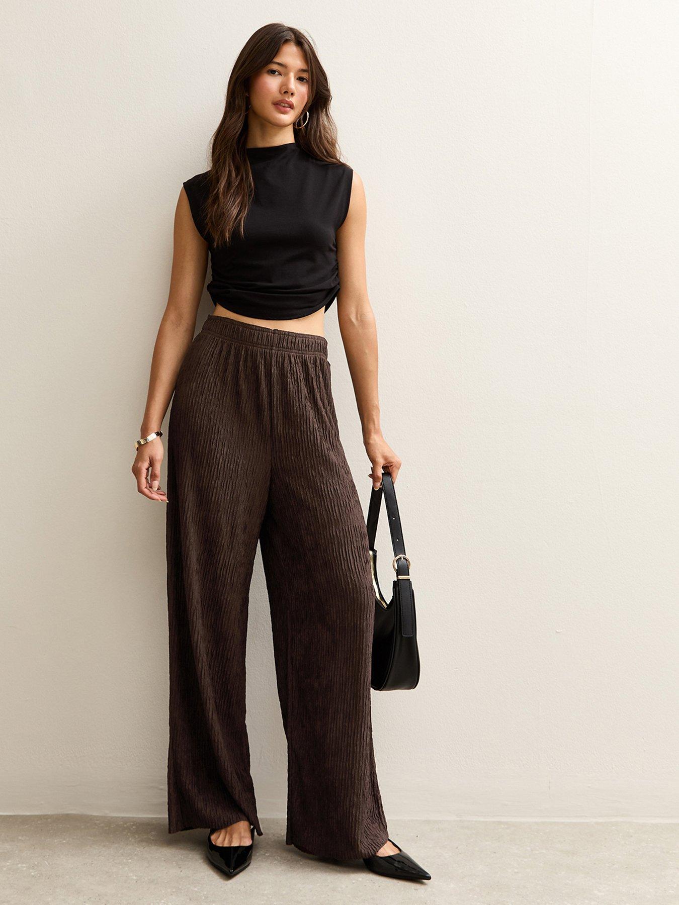 Image 1 of 6 of New Look Brown Textured Jersey Wide Leg Trousers