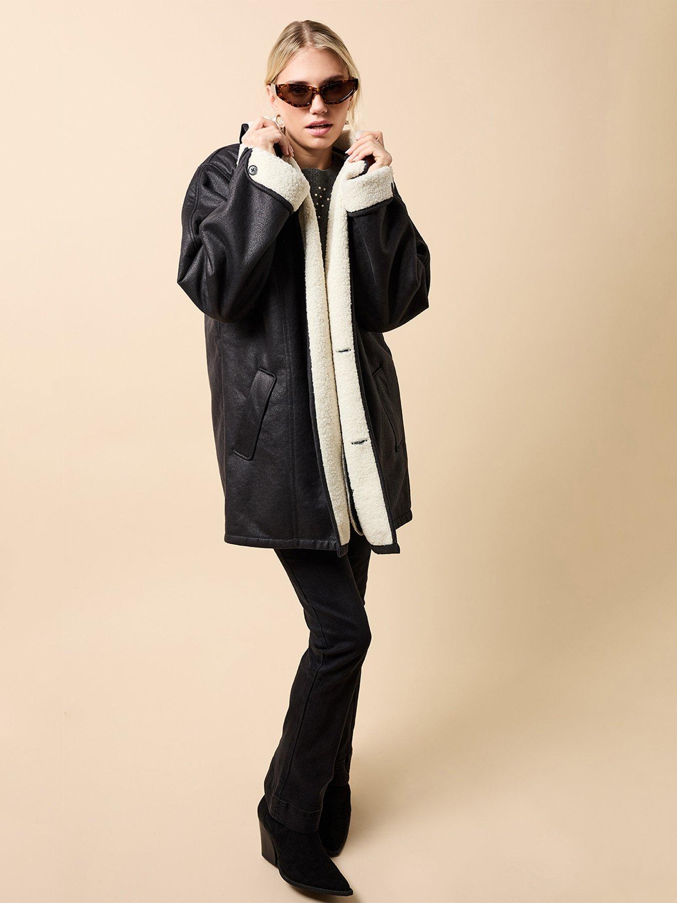 Image 3 of 4 of Little Mistress Suede Contrast Lining Borg Jacket - Black