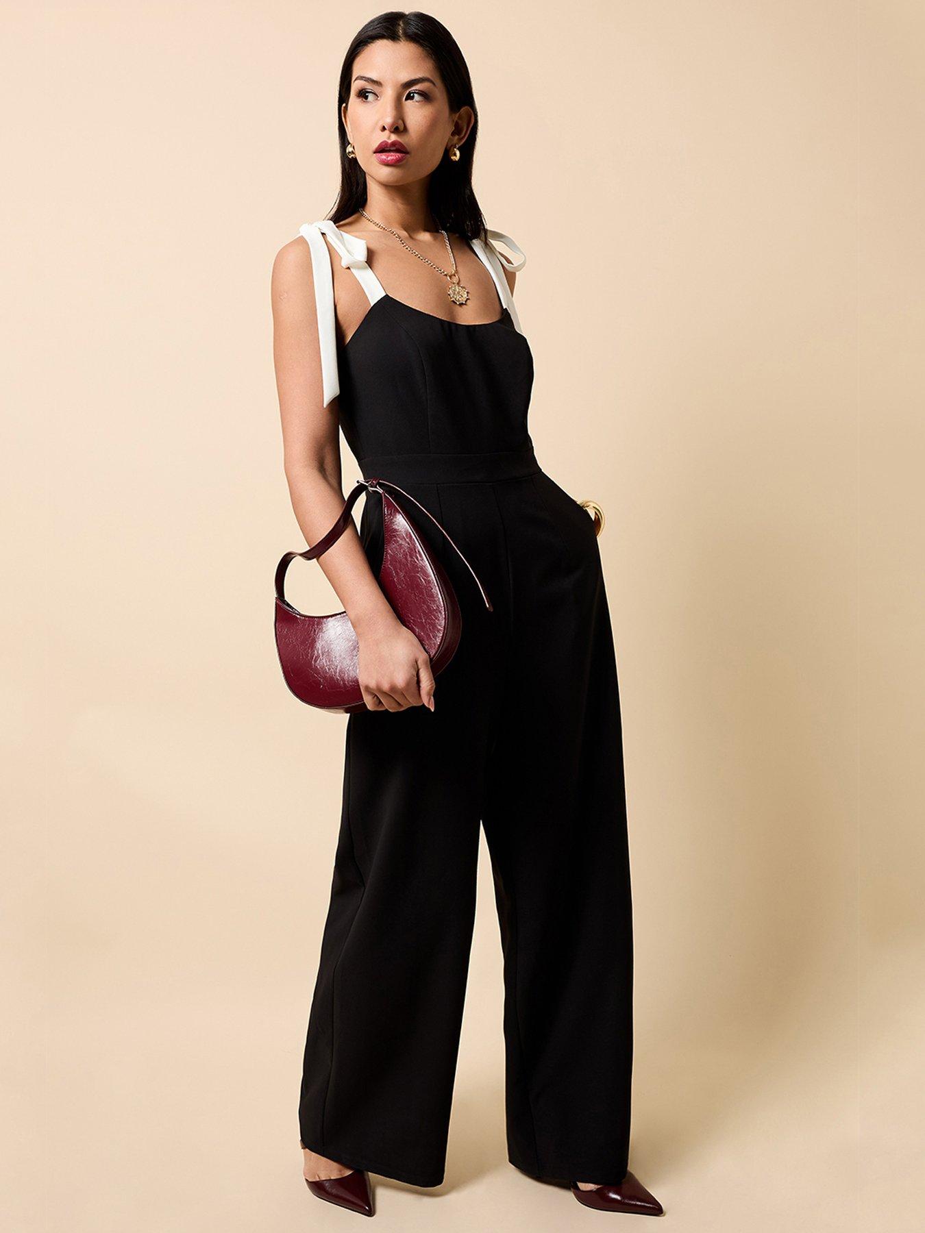 little-mistress-contrast-shoulder-bow-jumpsuit-black