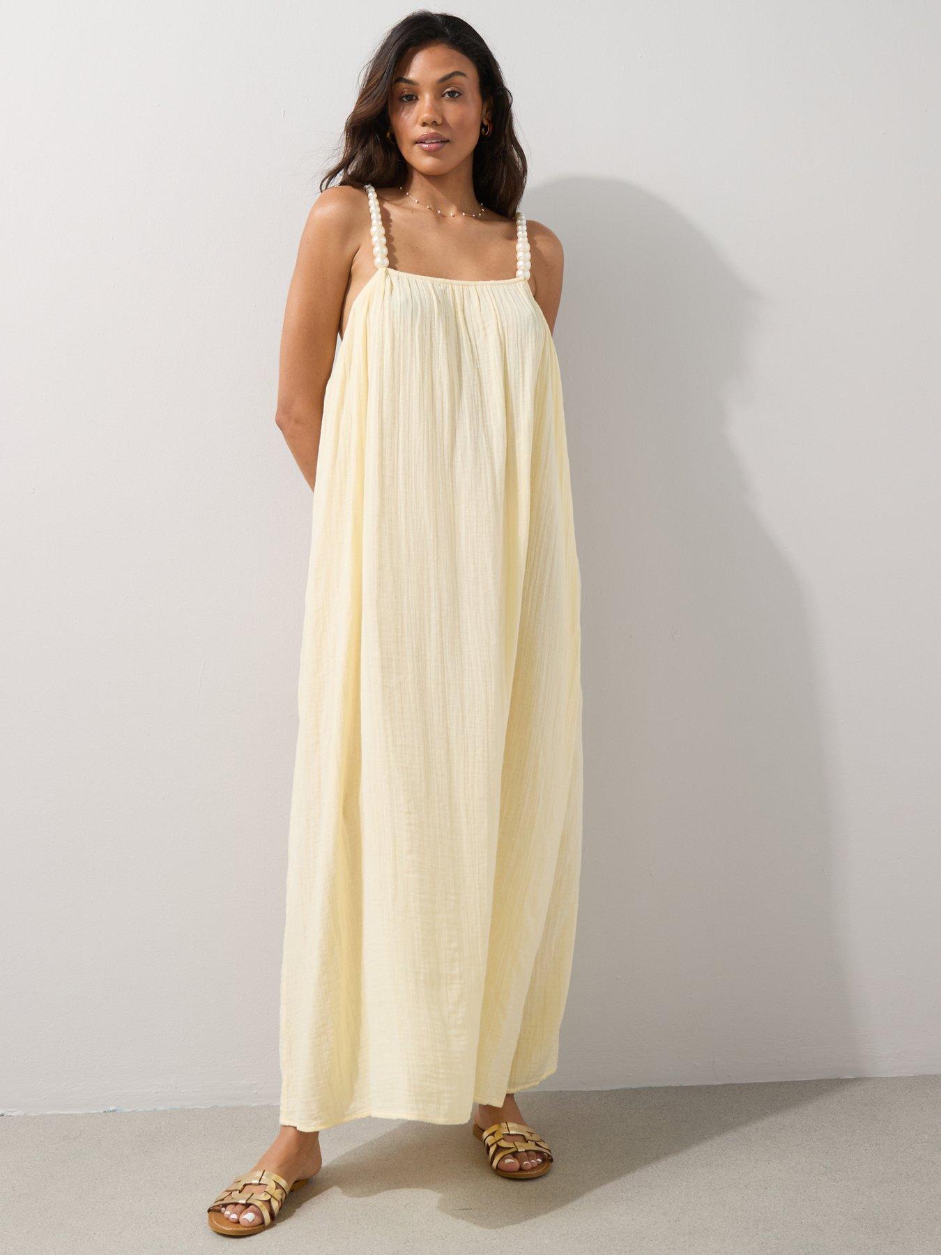 coral dress for beach wedding Confête