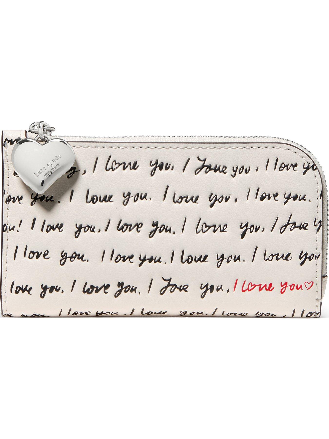Image 1 of 3 of Kate Spade New York Devin I Love You Embossed Leather Small Slim Bifold Wallet - Cream