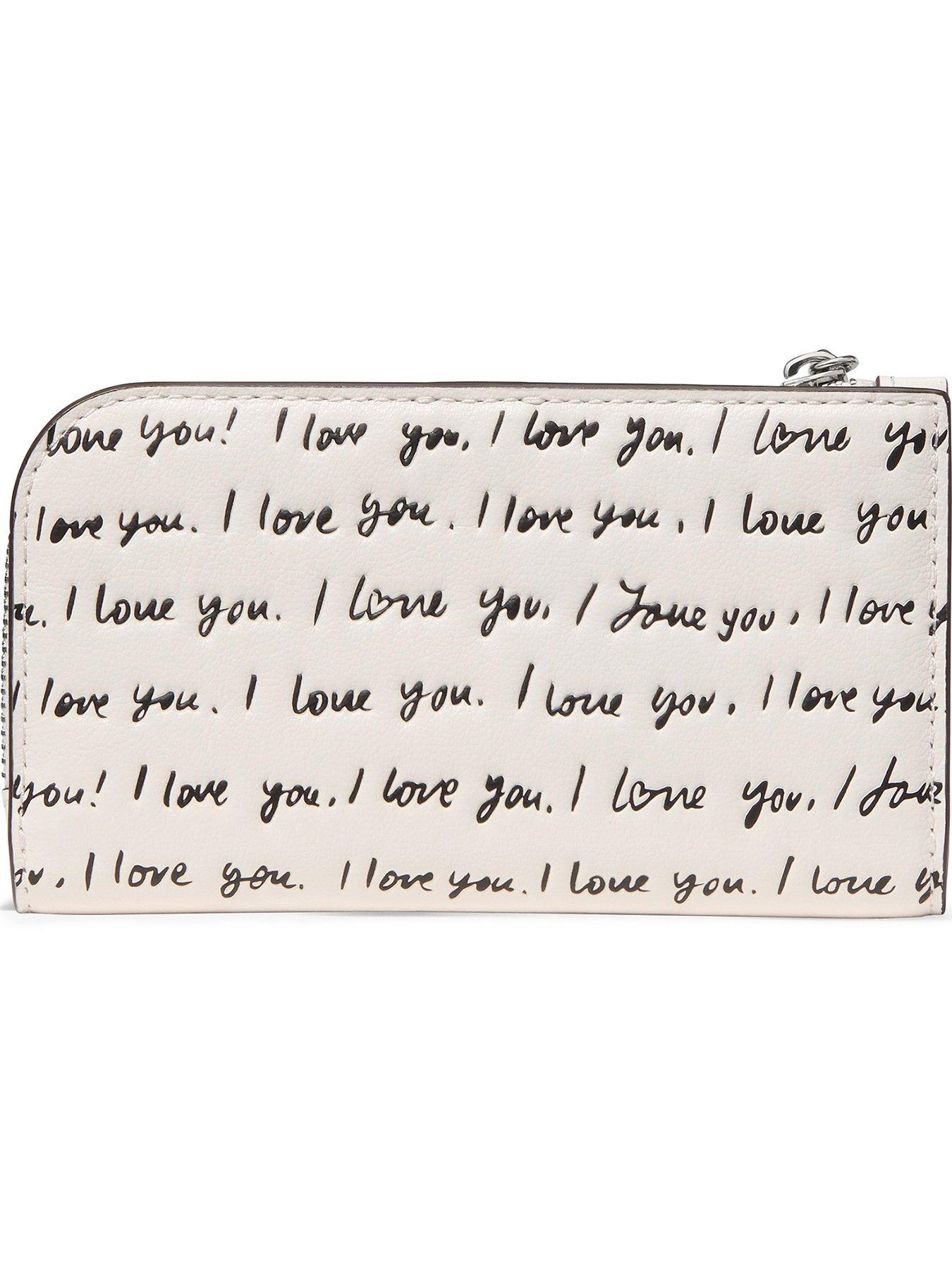 Image 2 of 3 of Kate Spade New York Devin I Love You Embossed Leather Small Slim Bifold Wallet - Cream