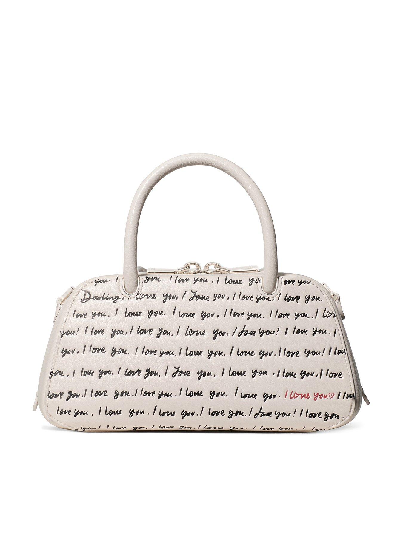 Image 1 of 4 of Kate Spade New York Grace I Love You Script Embossed Leather Mini Bag - Cream
