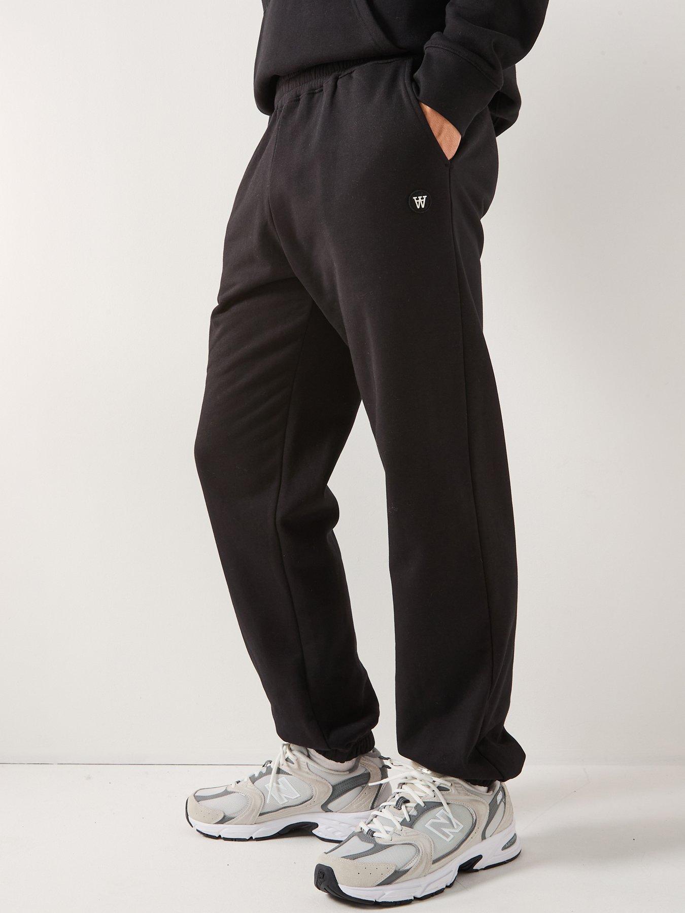 Image 1 of 6 of Double A by Wood Wood Double A By Cal Coin Logo Cuff Joggers - Black