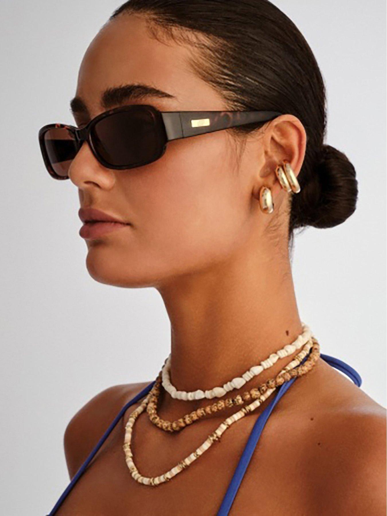 le-specs-gigglemug-rectangle-sunglasses-tortstillFront