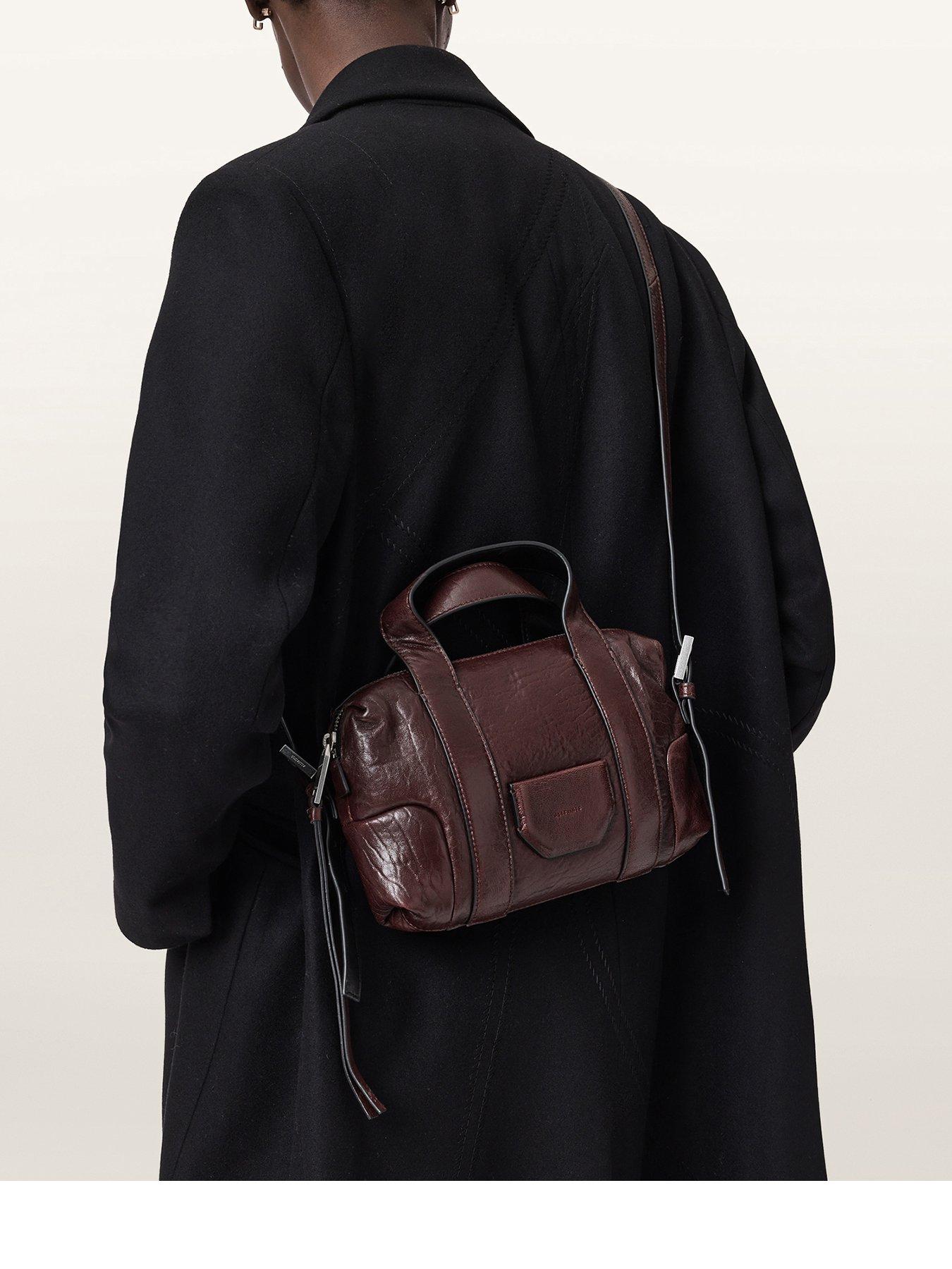 Image 1 of 5 of AllSaints Ares Grain Compact Cross Body Bag - Red