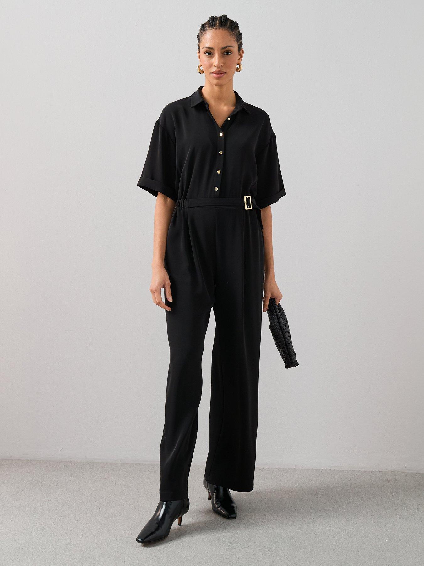 Image 1 of 7 of The Very Collection Belted Button Down Jumpsuit - Black