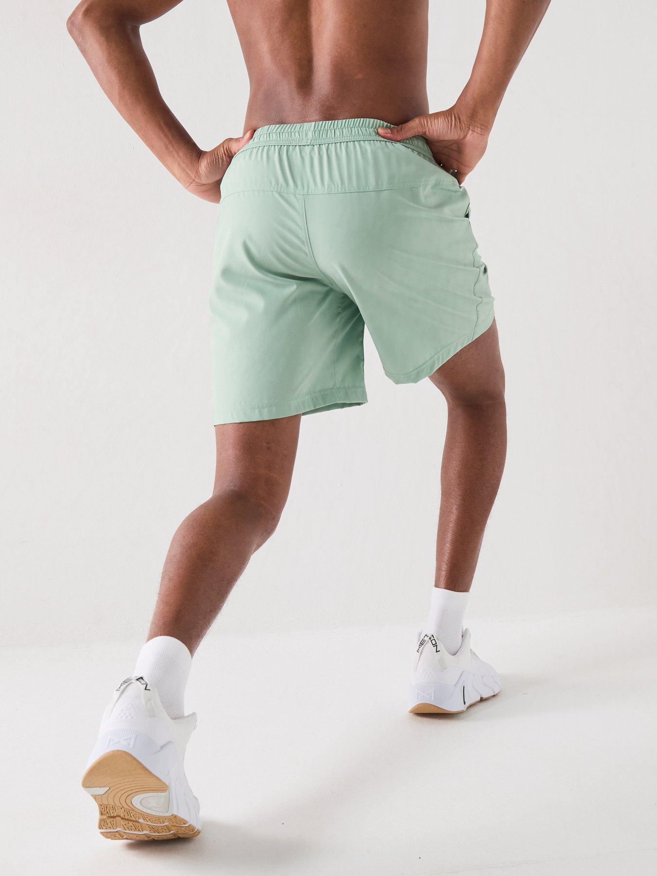 Image 2 of 5 of Nike Mens Training Dri-FIT 7 Inch Unlined Versatile Shorts - Green