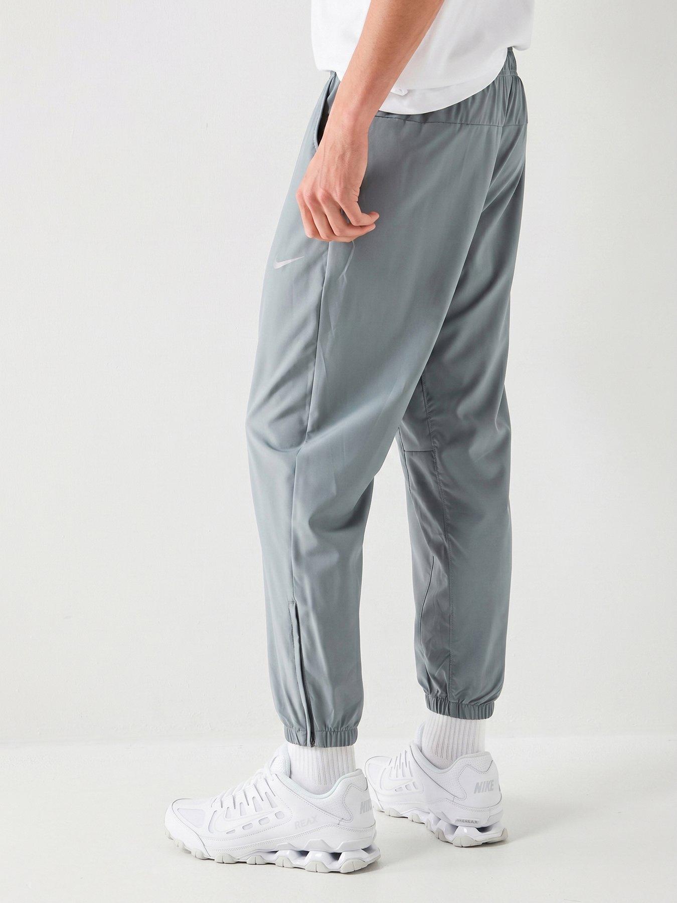 nike-mens-training-dri-fit-tapered-versatile-pants-greystillFront