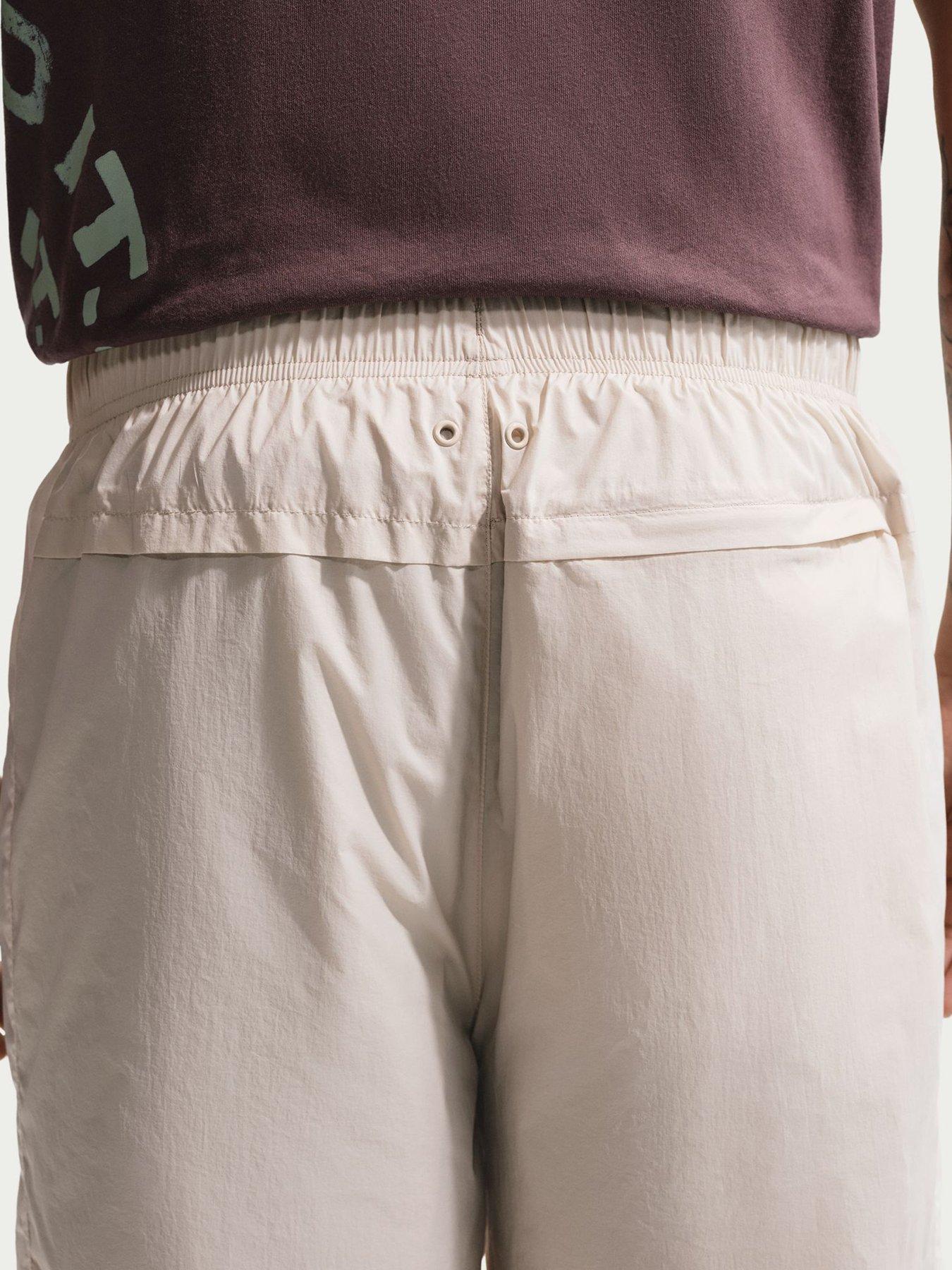 nike-mens-windrunner-lightweight-uv-pants-brownstillFront