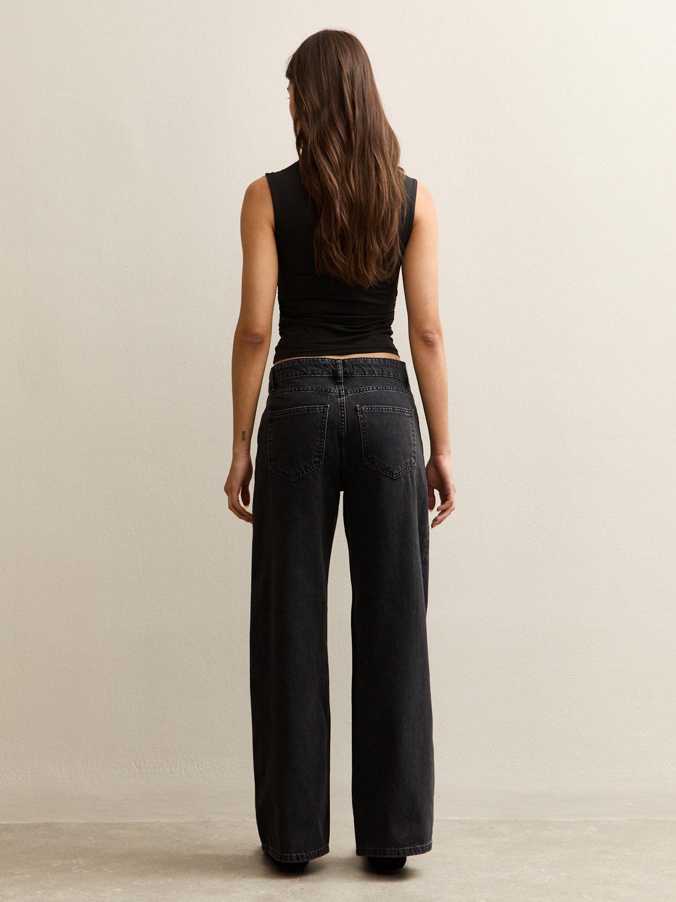 Image 2 of 5 of New Look Black Low Rise Wide Leg Jeans