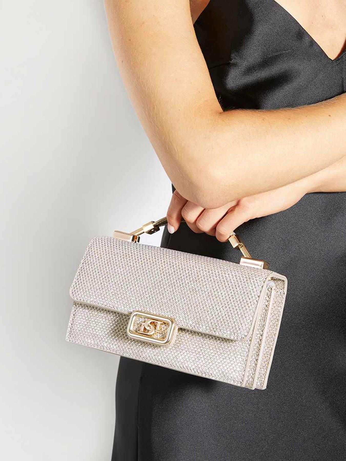 dune-london-skilled-top-handle-micro-bag-gold