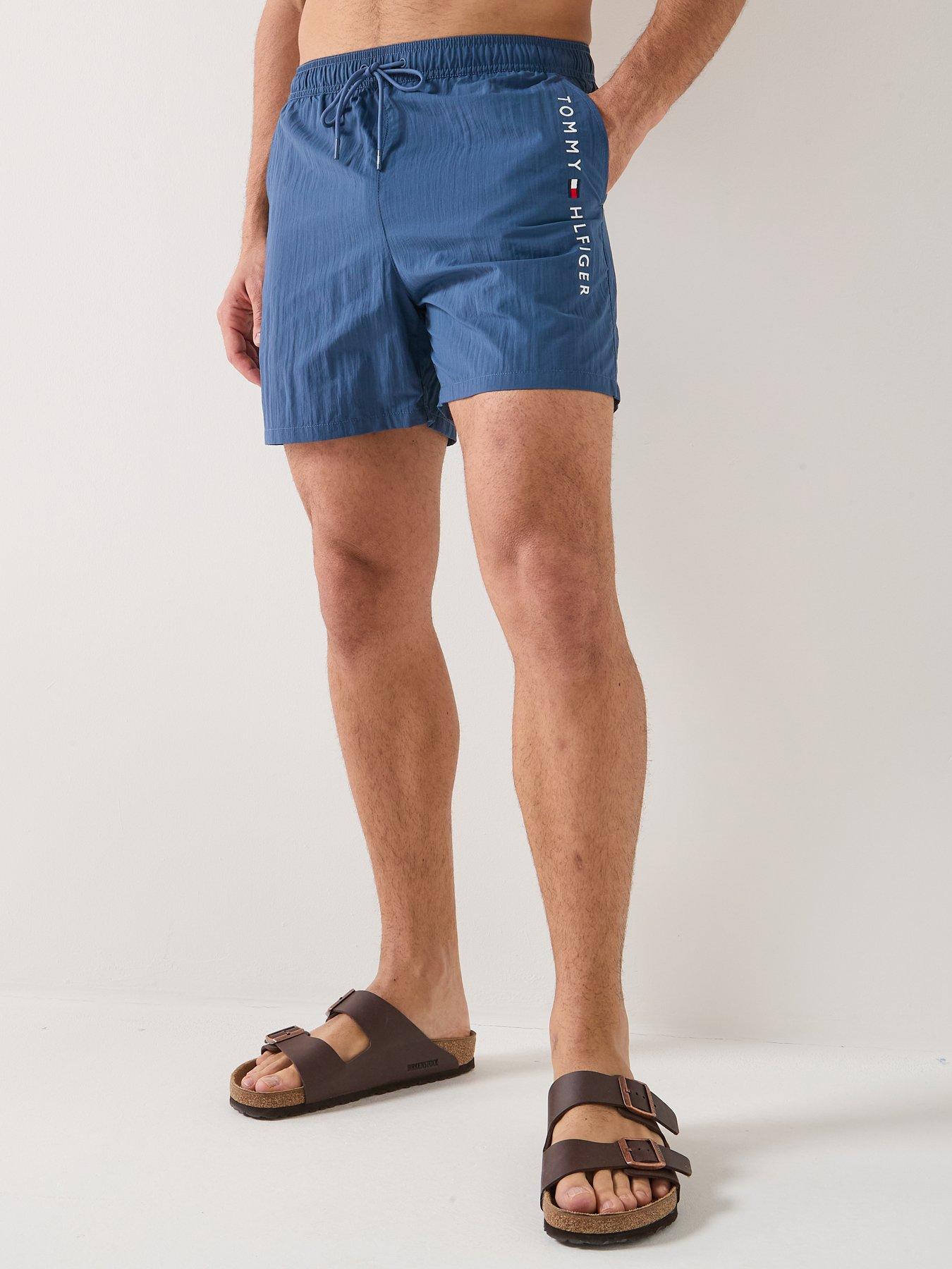 Image 1 of 6 of Tommy Hilfiger Side Linear Logo Swimshorts - Blue