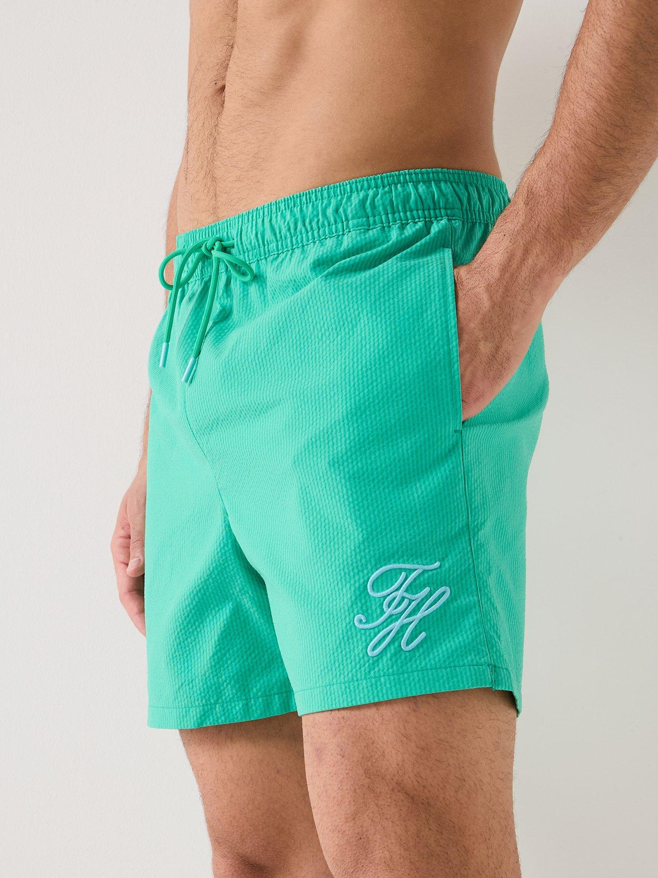 tommy-hilfiger-mono-script-ithaca-medium-swim-shorts-light-greenoutfit