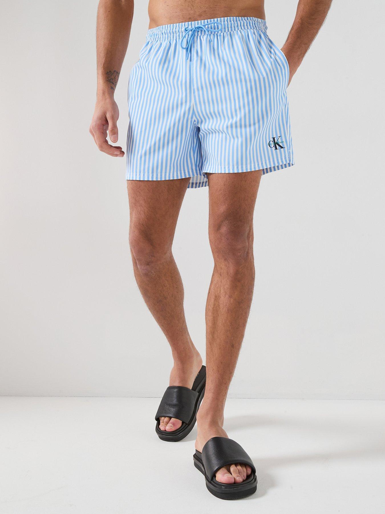 calvin-klein-graphic-mono-logo-striped-medium-swim-shorts-light-bluefront