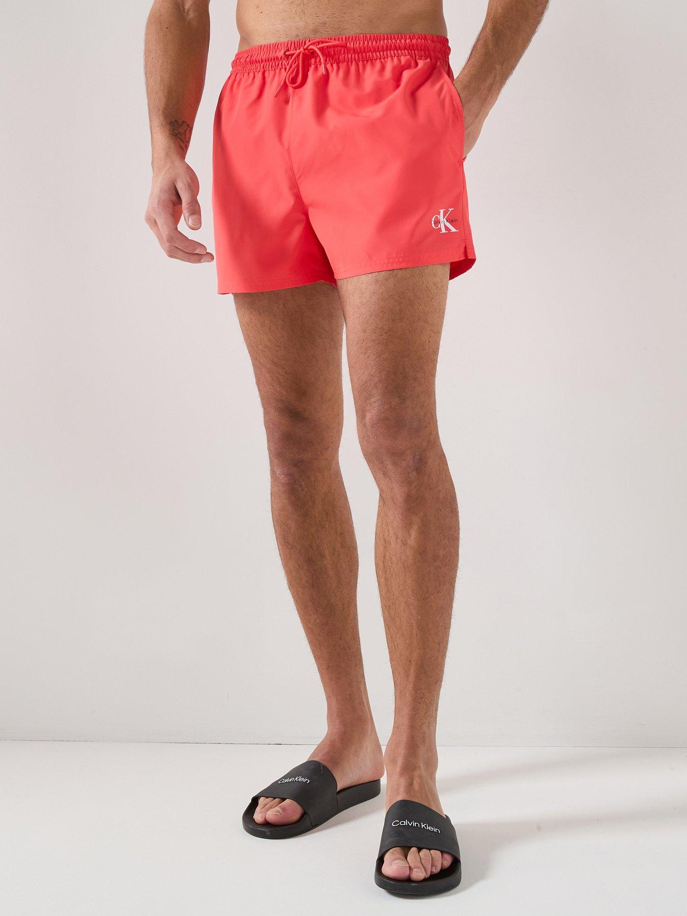 calvin-klein-graphic-mono-logo-short-swim-shorts-orange