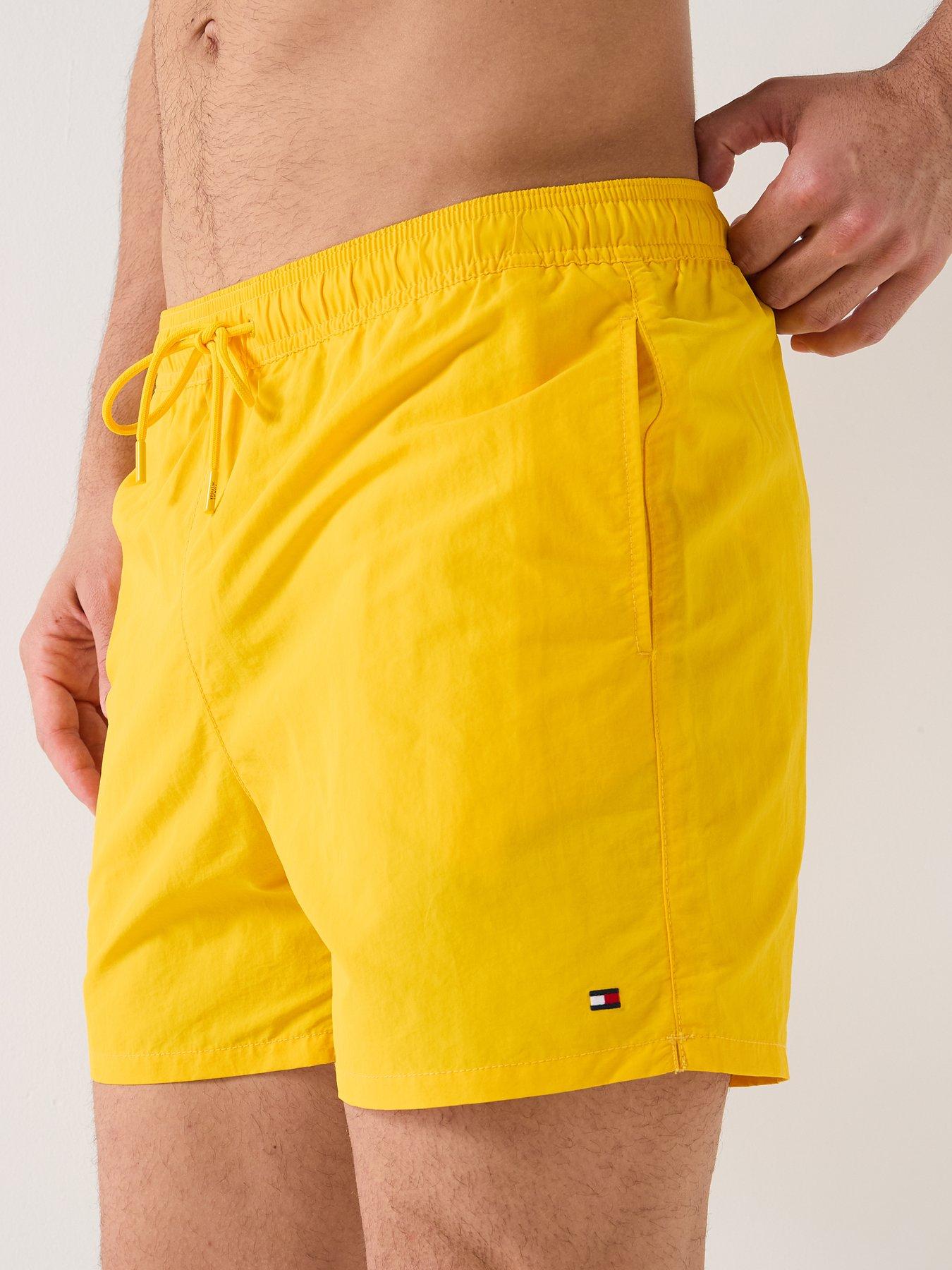 tommy-hilfiger-essential-small-flag-medium-swim-shorts-yellowoutfit