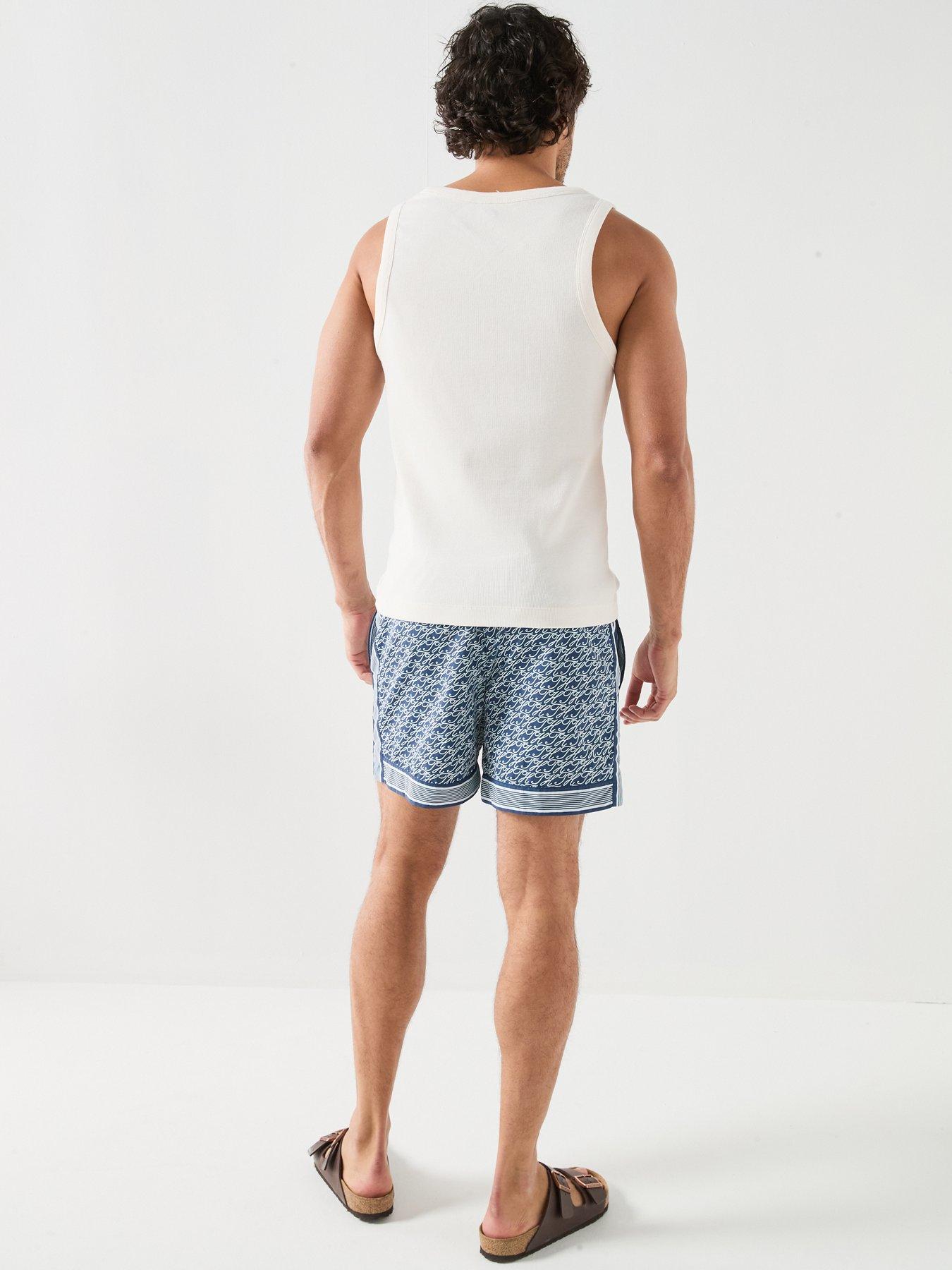 tommy-hilfiger-mono-script-logo-rib-vest-off-whitestillFront