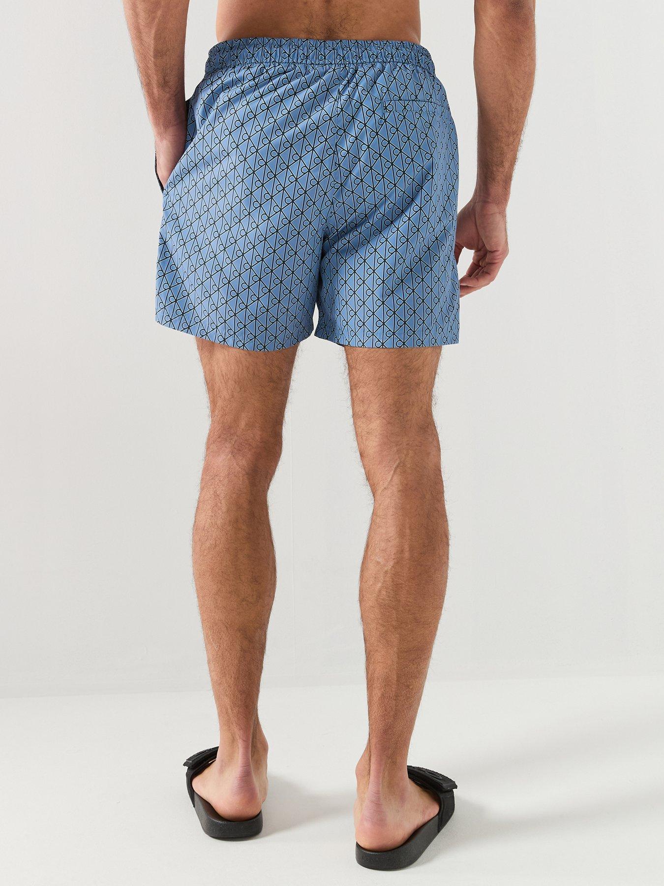 Image 2 of 6 of Calvin Klein Essential All Over Emblem Medium Swim Shorts - Blue
