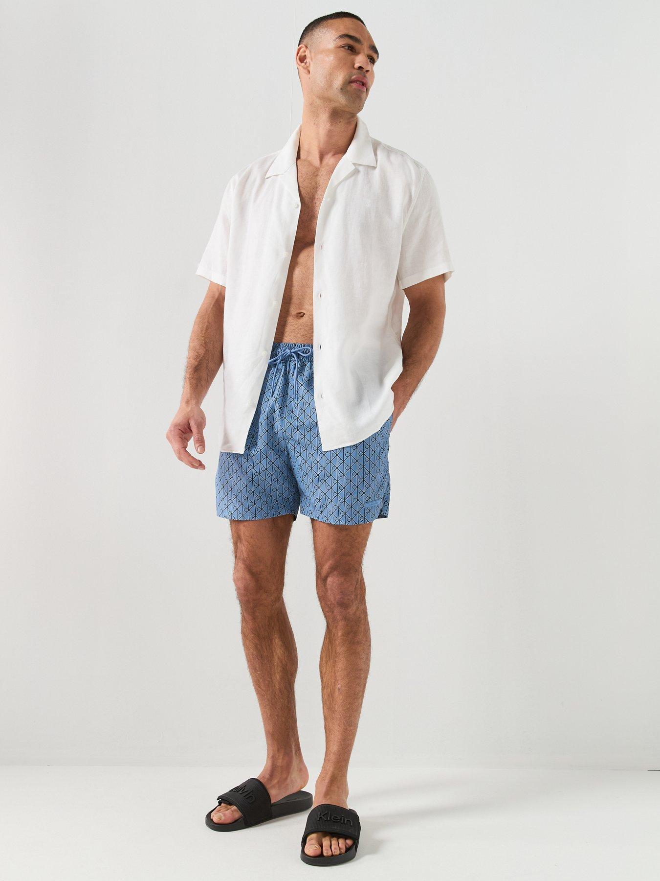 Image 3 of 6 of Calvin Klein Essential All Over Emblem Medium Swim Shorts - Blue