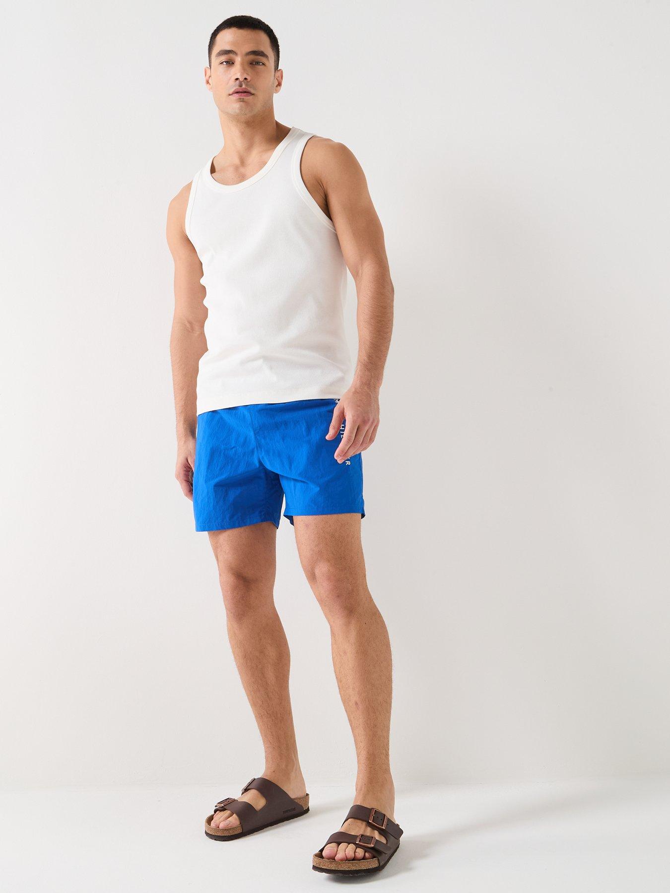 tommy-hilfiger-tommy-hilfiger-side-linear-logo-swimshorts-blueback