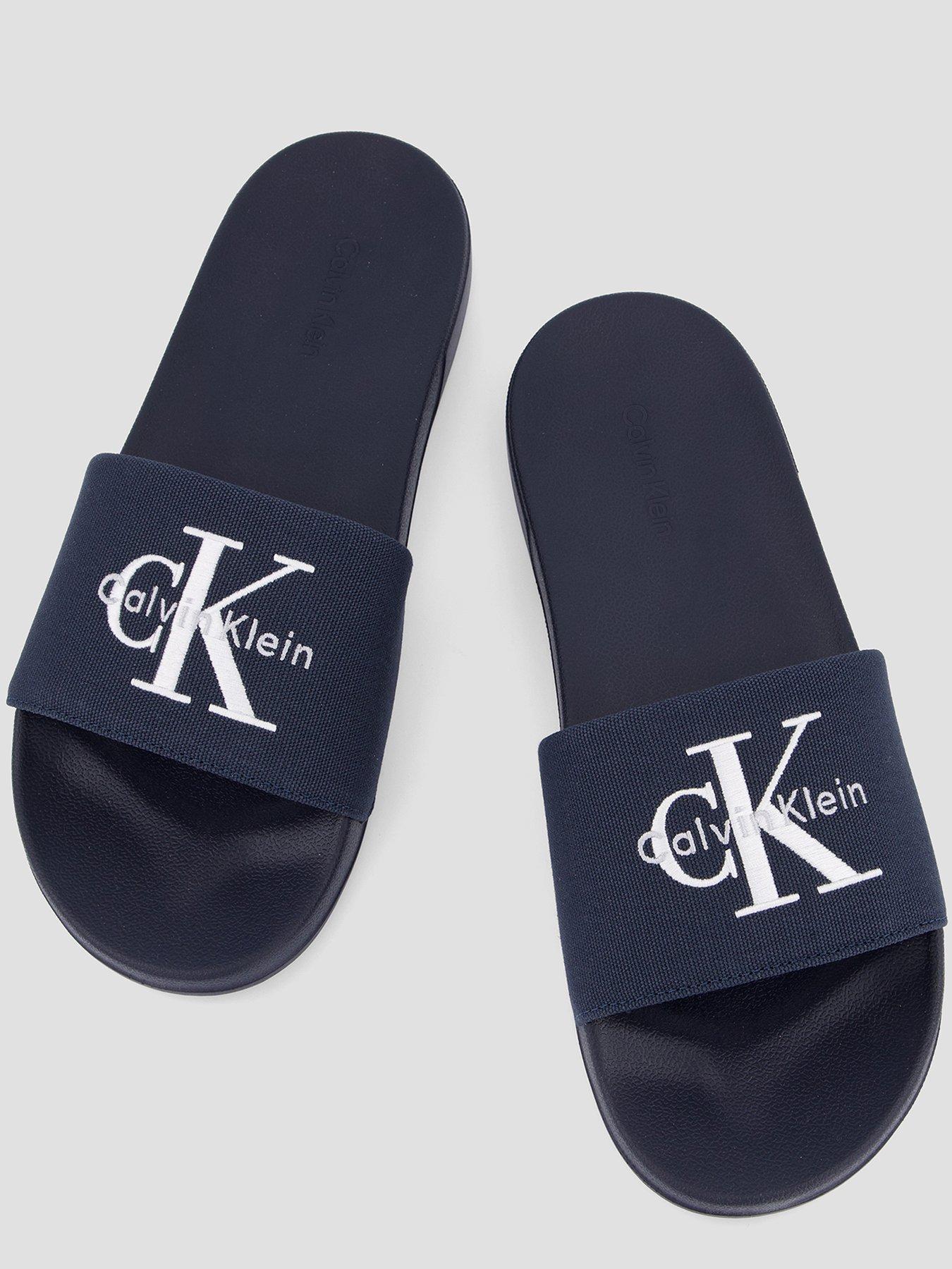 calvin-klein-essential-signature-logo-slider-navyoutfit