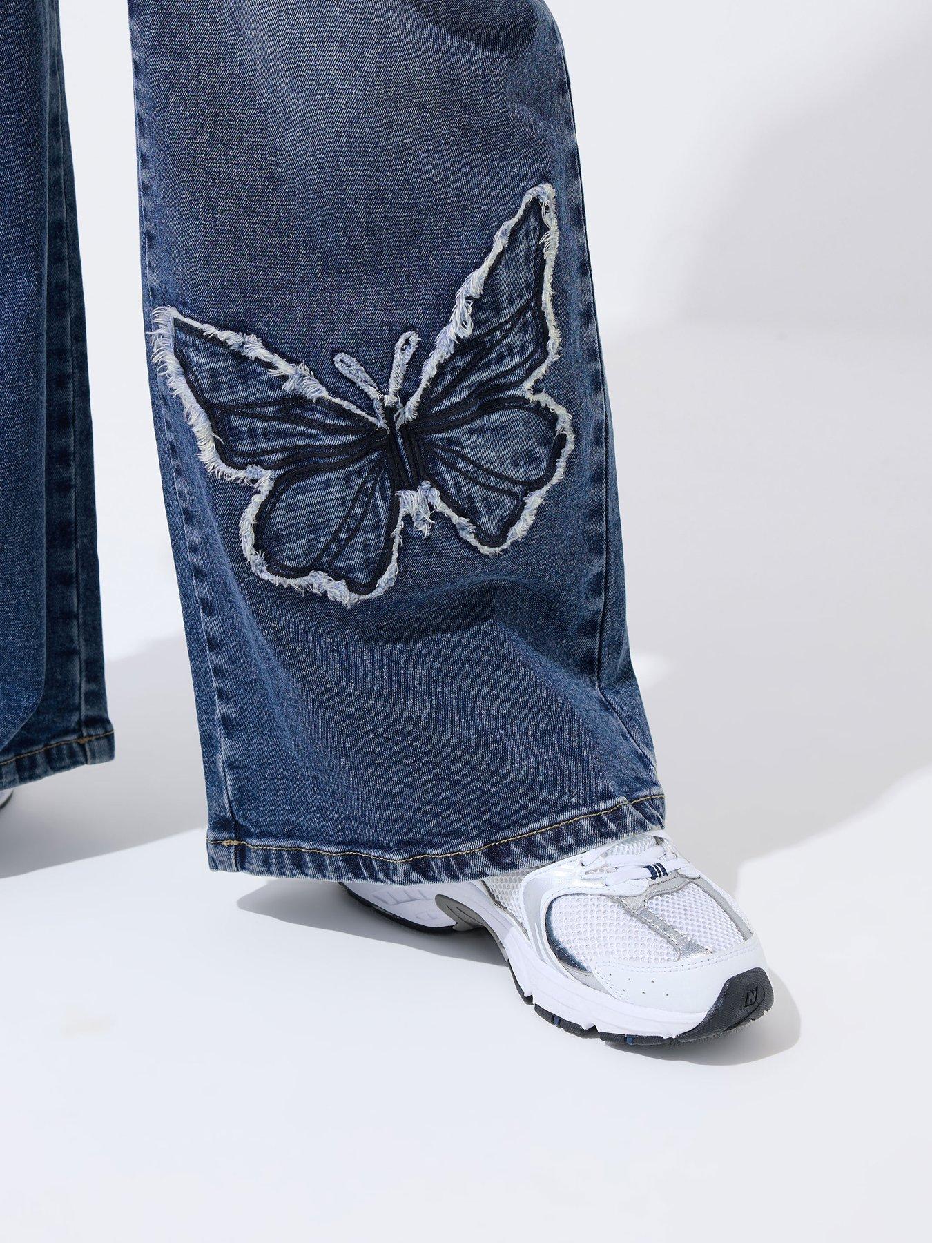 Image 4 of 5 of Yours Curve Butterfly Embroidered Jeans - Blue