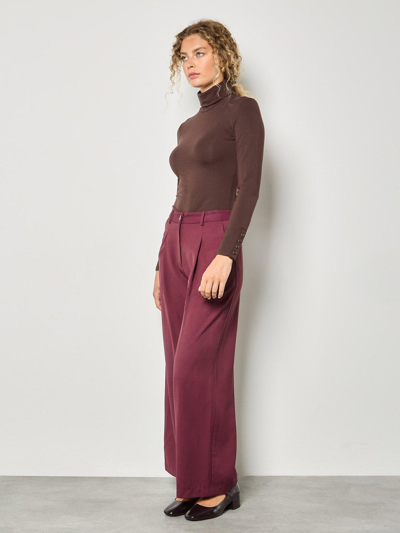 Image 3 of 4 of Apricot Apricot Turtle Neck Button Cuff Top
