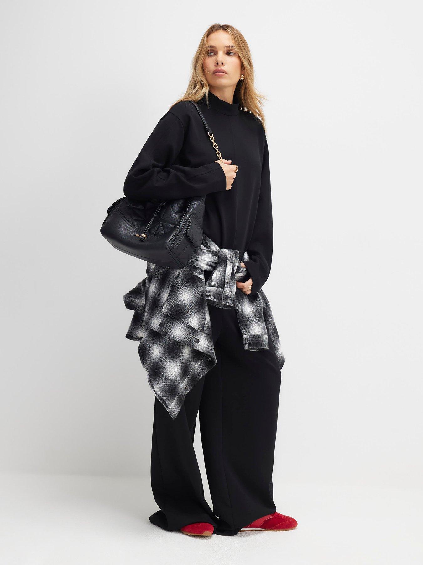 Image 3 of 4 of River Island Long Sleeve Interlock Funnel Neck Top - Black