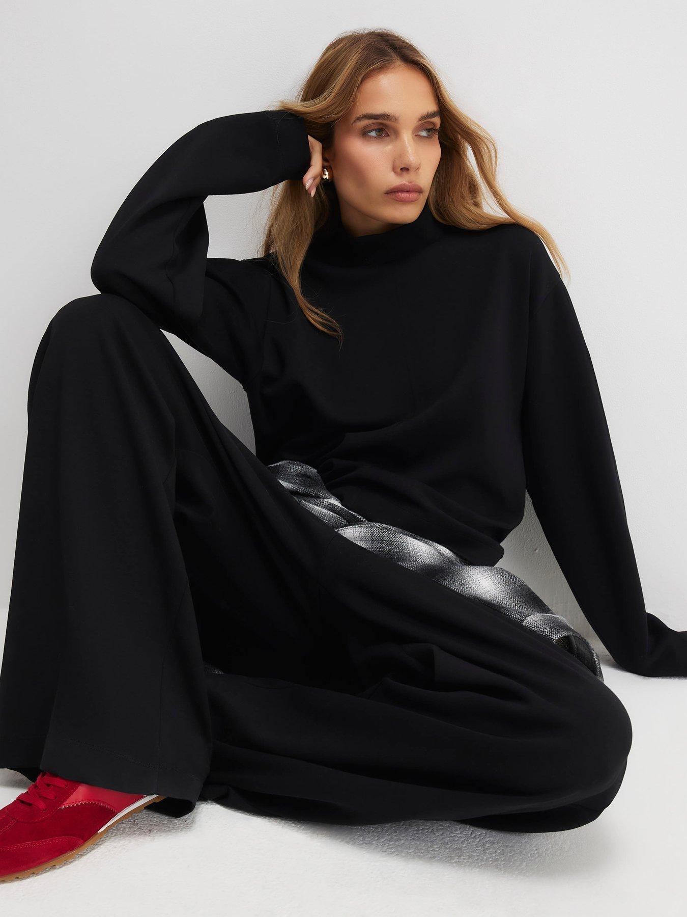 Image 4 of 4 of River Island Long Sleeve Interlock Funnel Neck Top - Black