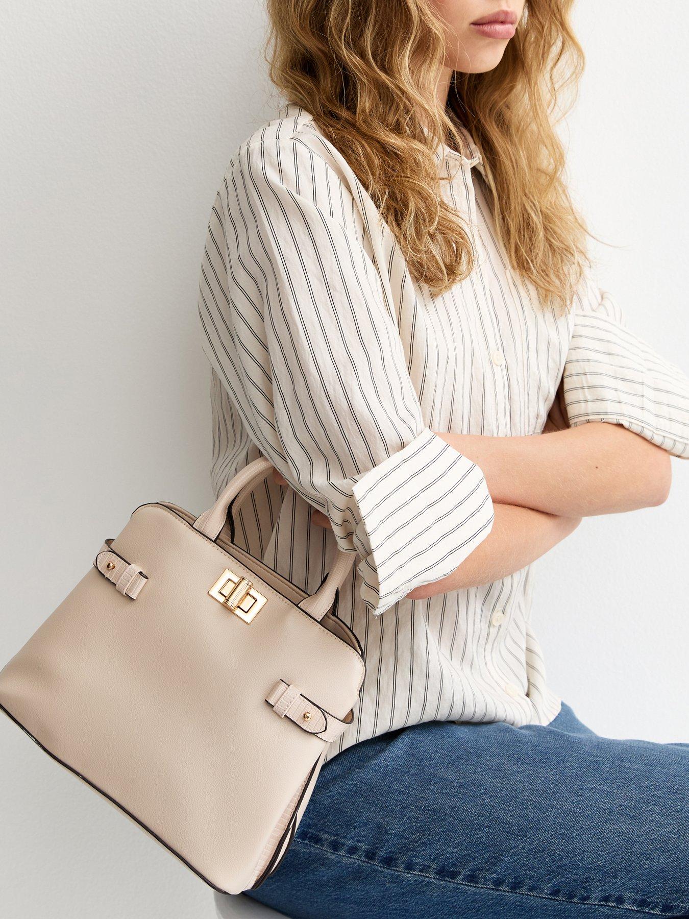 Image 1 of 5 of New Look Faux Leather Gusset Turn Lock Top Handle Bag - White