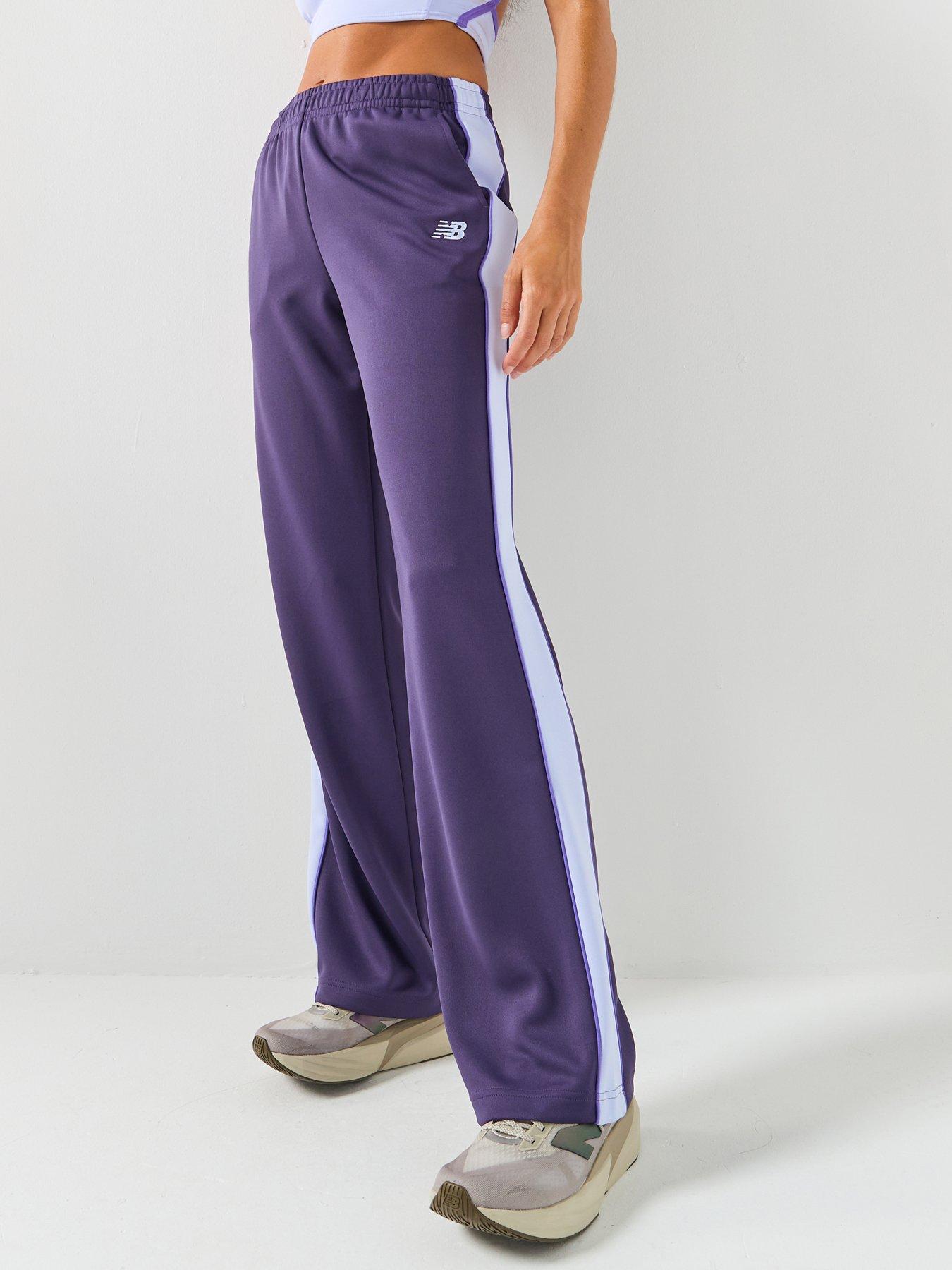 Image 1 of 6 of New Balance Womens Interlock Pant -Blue