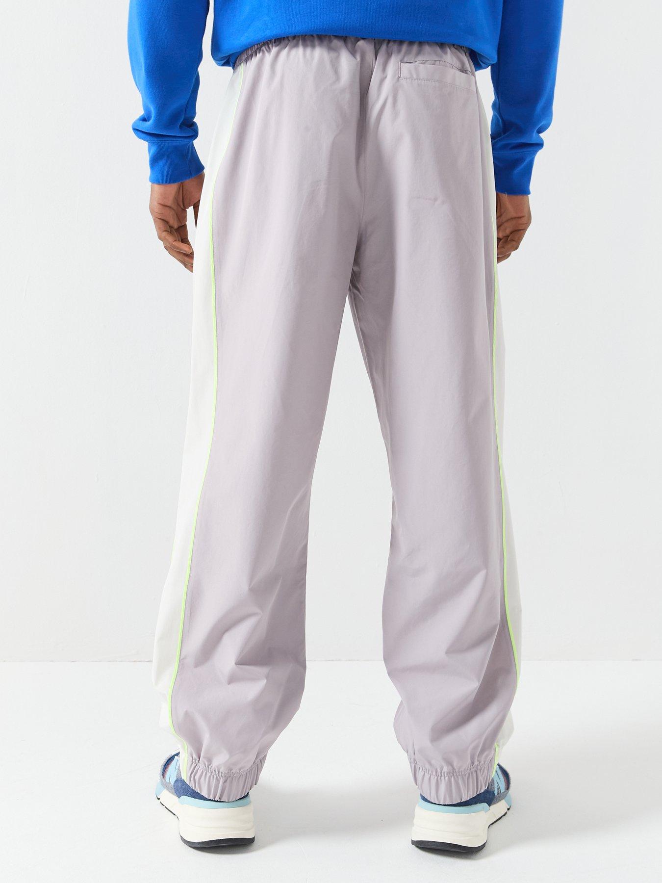 new-balance-mens-linear-graphic-woven-pant-greystillFront