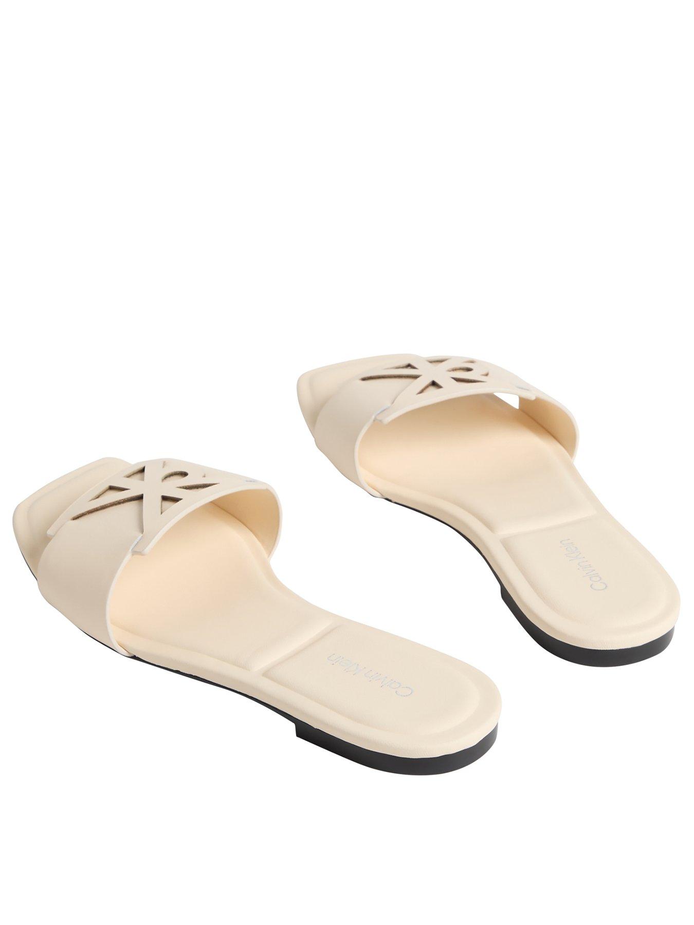 calvin-klein-square-flat-sandal-emblem-beigeback
