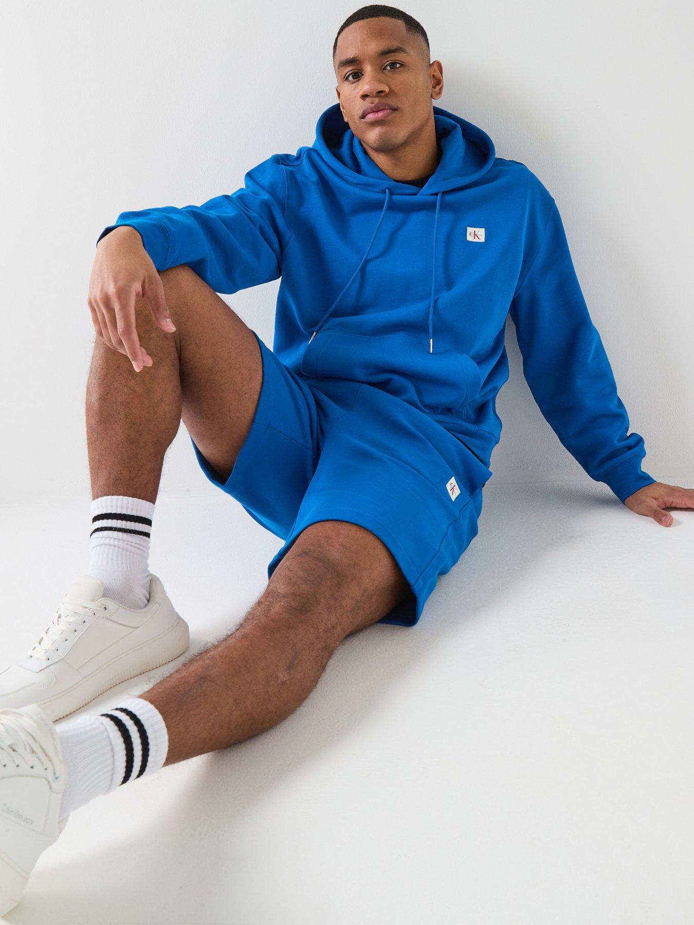 Image 4 of 6 of Calvin Klein Jeans Sweat Badge Short Shorts - Classic Blue