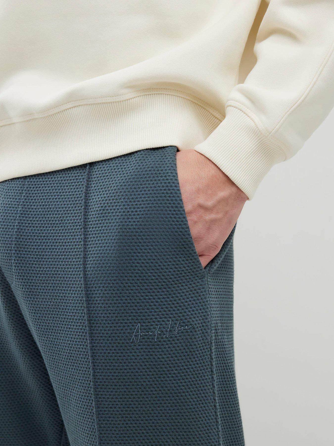 Image 4 of 4 of River Island Slim Bubble Interlock Joggers - Grey