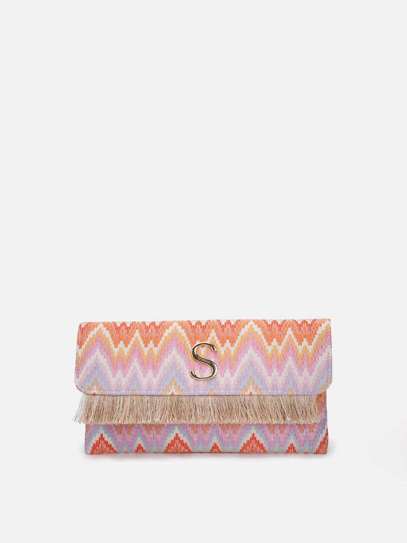 sorena-harites-clutch-caldera-pinkoutfit