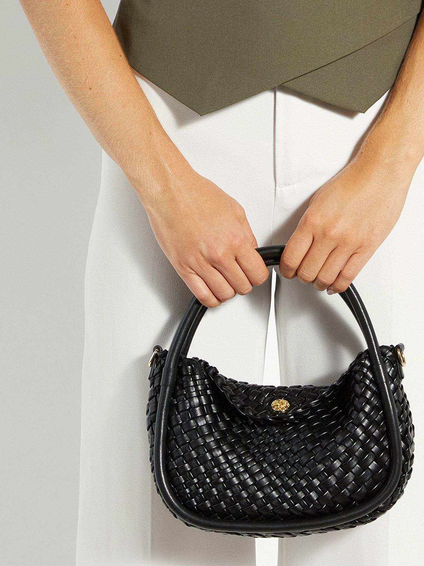 dune-london-dinideliberate-mini-woven-grab-bag-blackstillFront