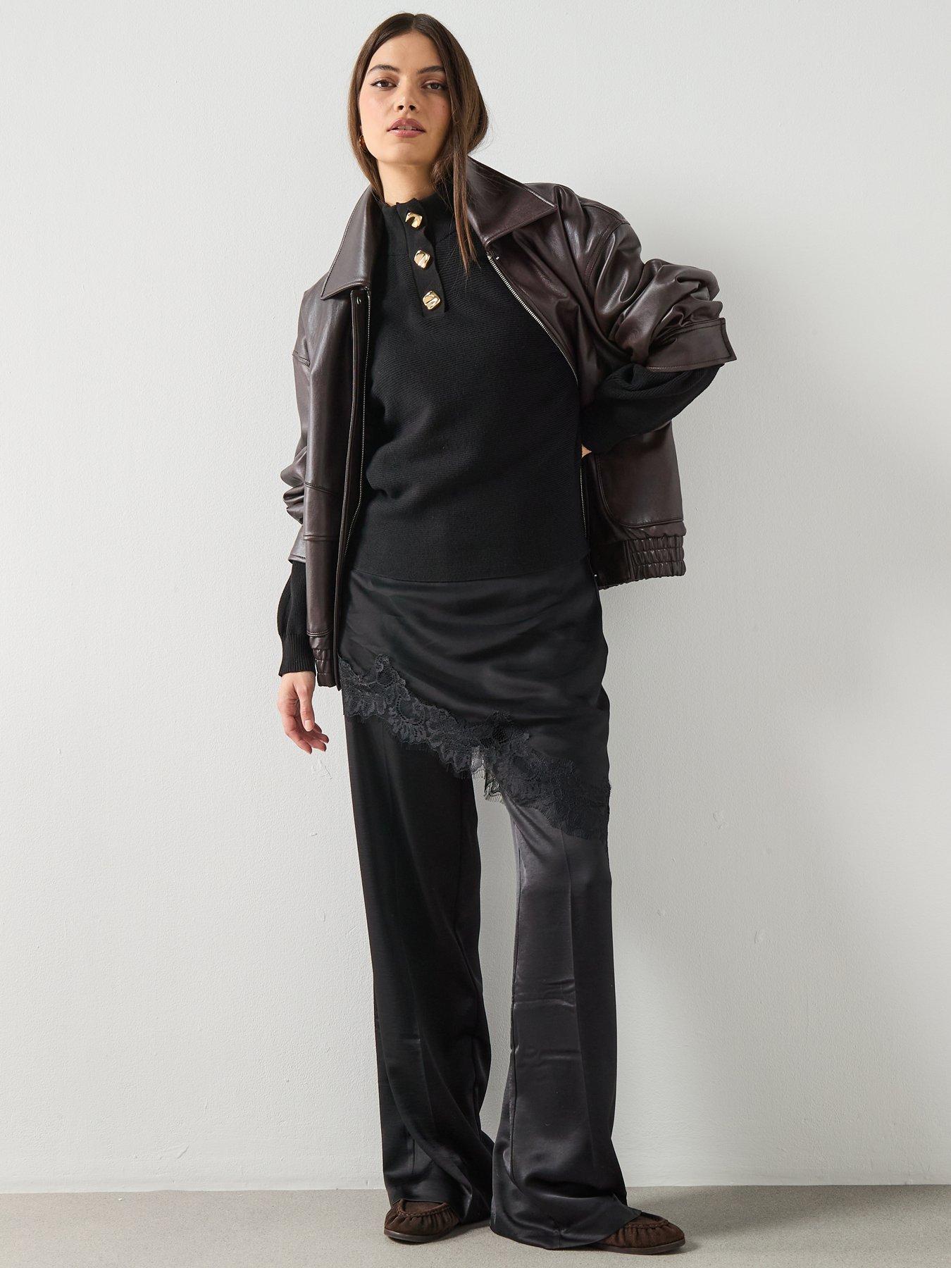 mango-turtleneck-sweater-with-jewel-buttons-blackback