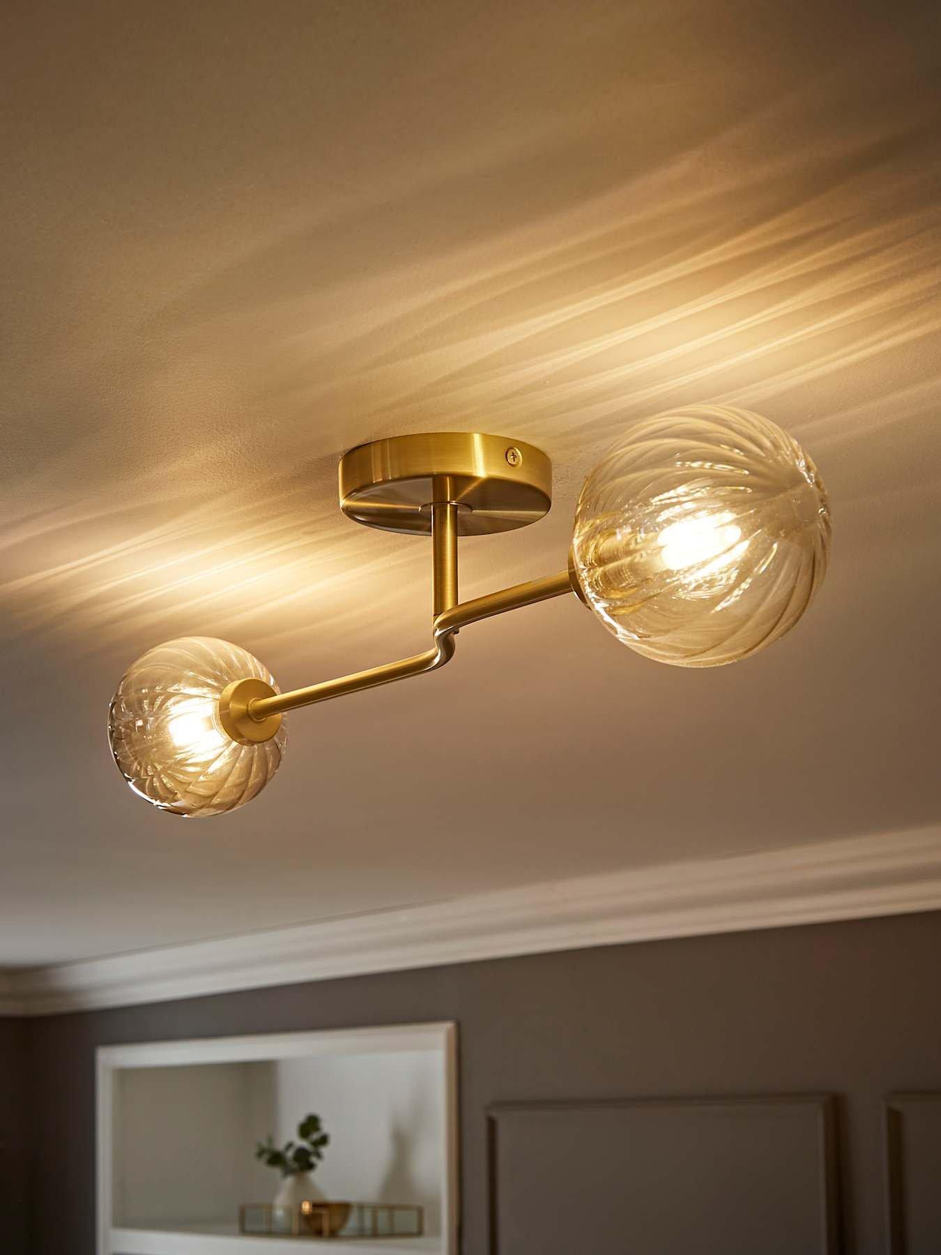 valuelights-chessy-gold-metal-bar-2-way-ceiling-light-with-amber-ribbed-glass-globe-shades