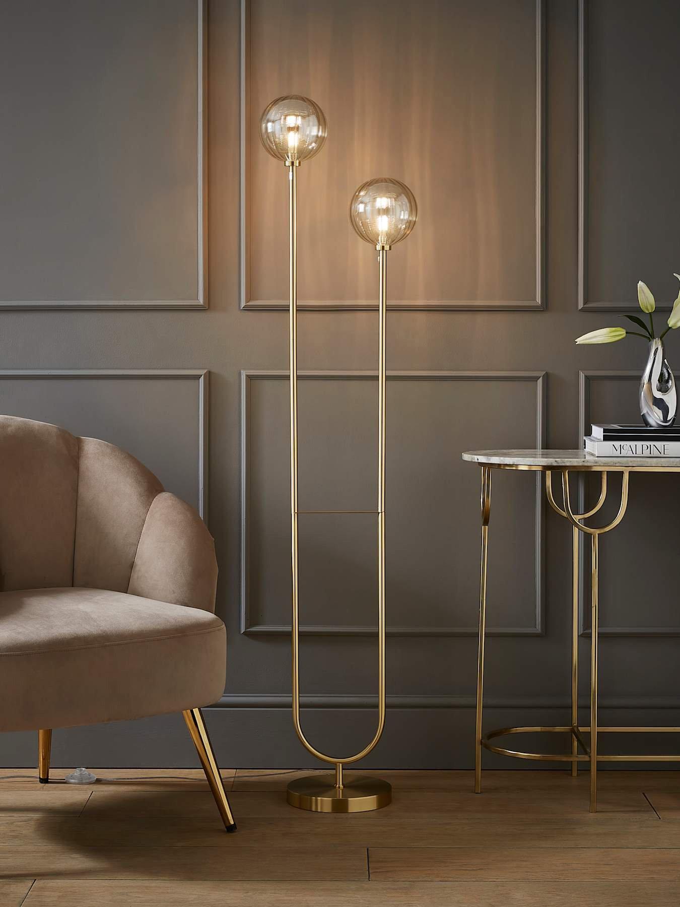 valuelights-chessy-gold-metal-bar-2-way-dual-floor-lamp-with-amber-ribbed-glass-globe-shadesfront