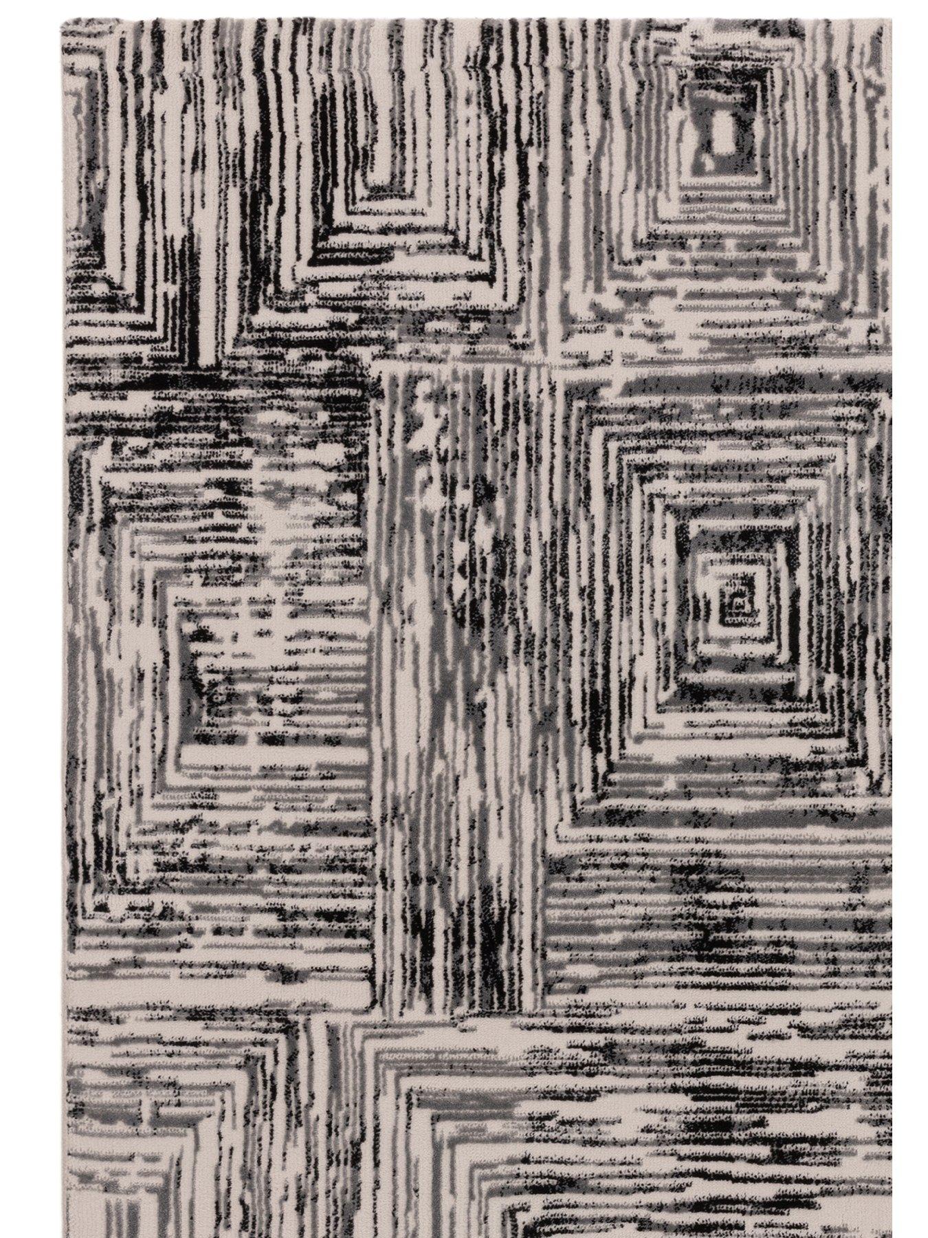 asiatic-kuza-portrait-rug-greyoutfit