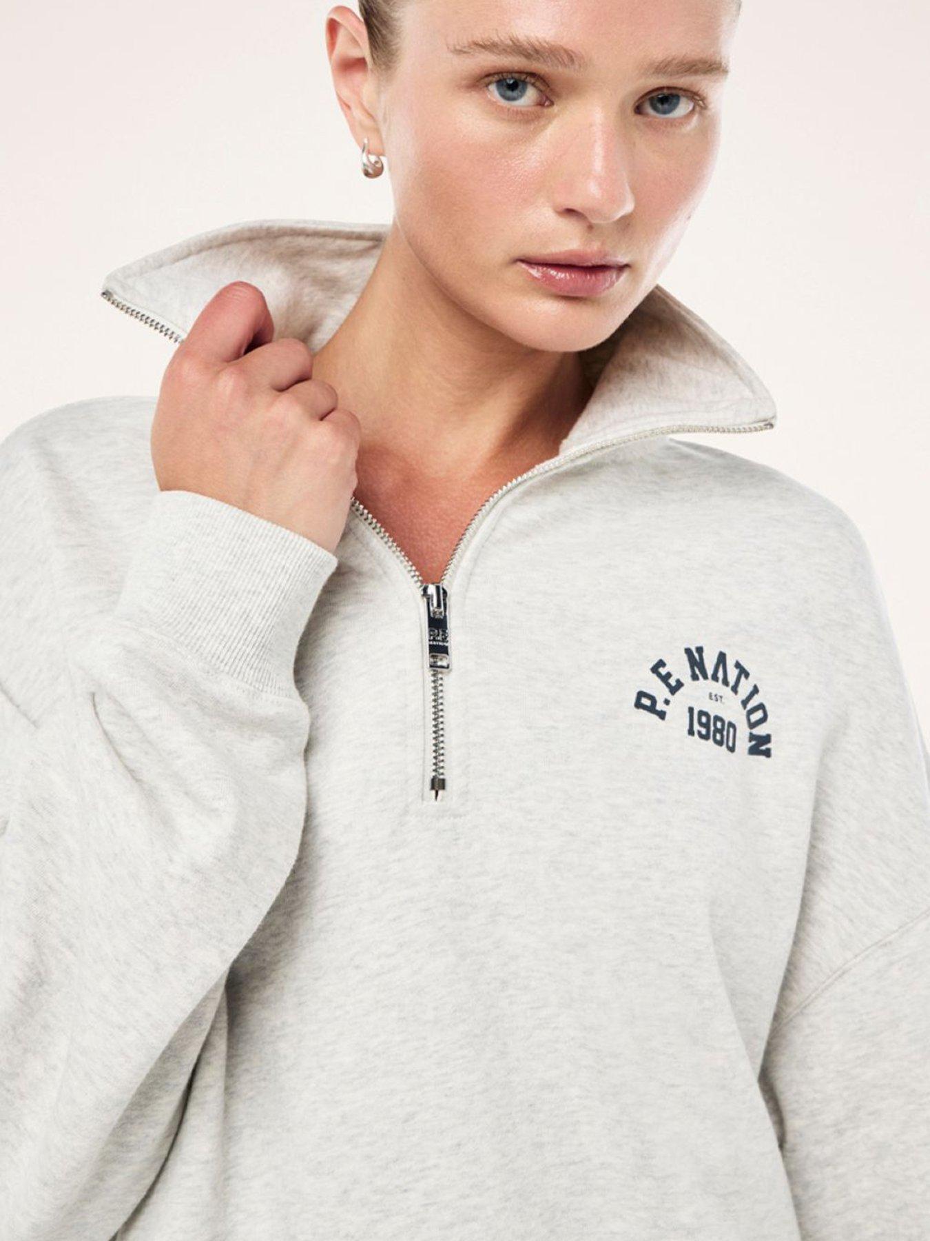 pe-nation-womens-training-swerve-zip-neck-greydetail